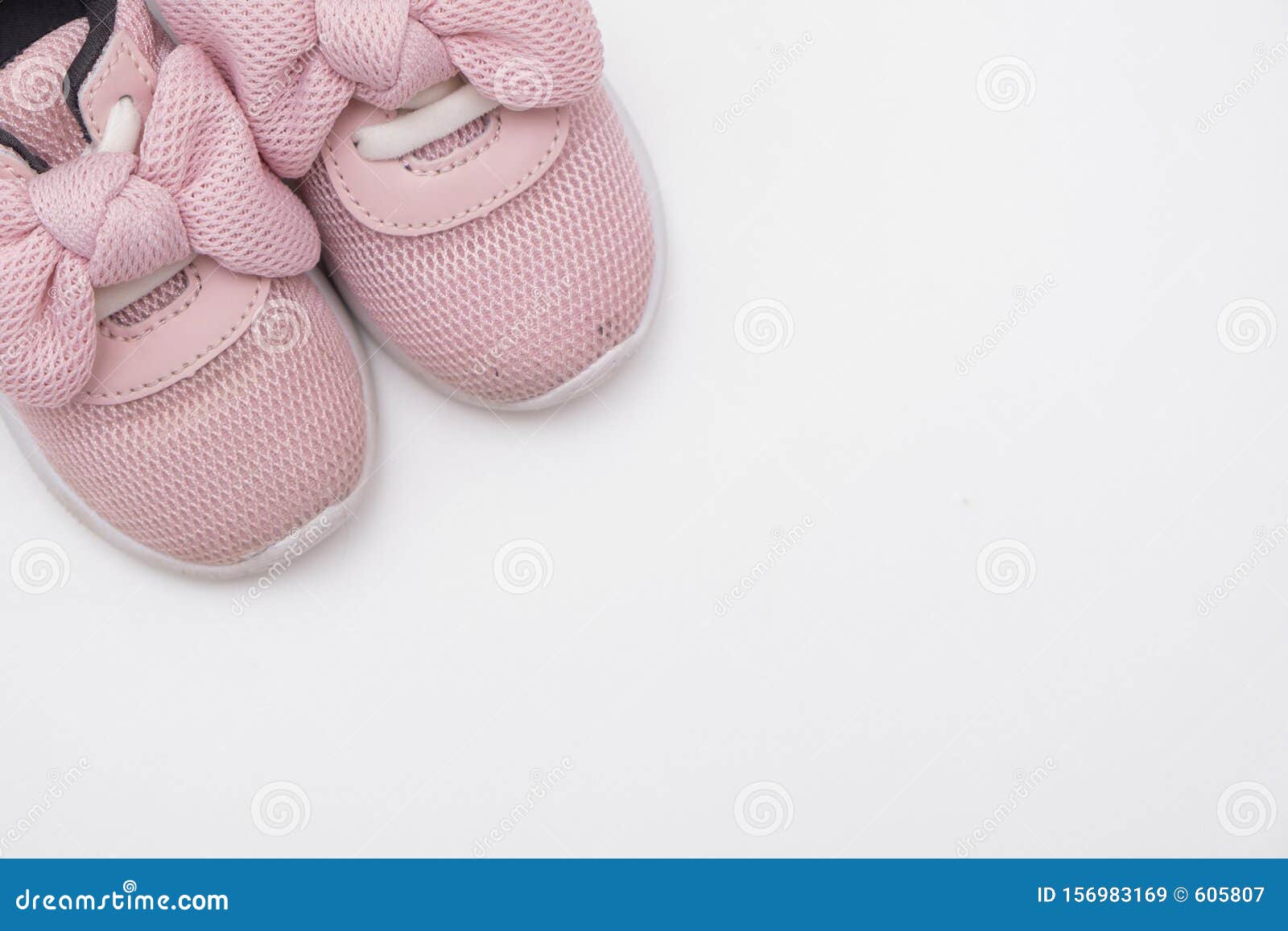 Pink Baby Sneakers On A White Background, Copy Space Stock Image