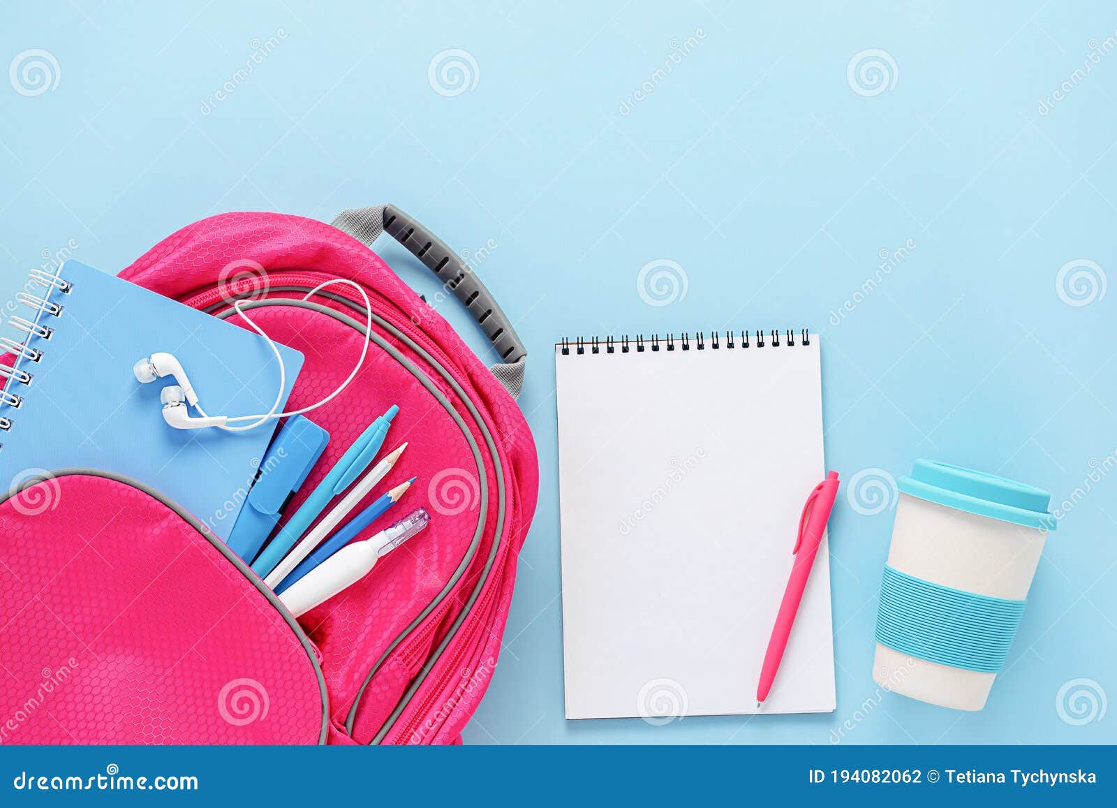 Download Pink Backpack Filled With Stationery And Reusable Eco Cup On Blue Background. Overhead, Mockup ...