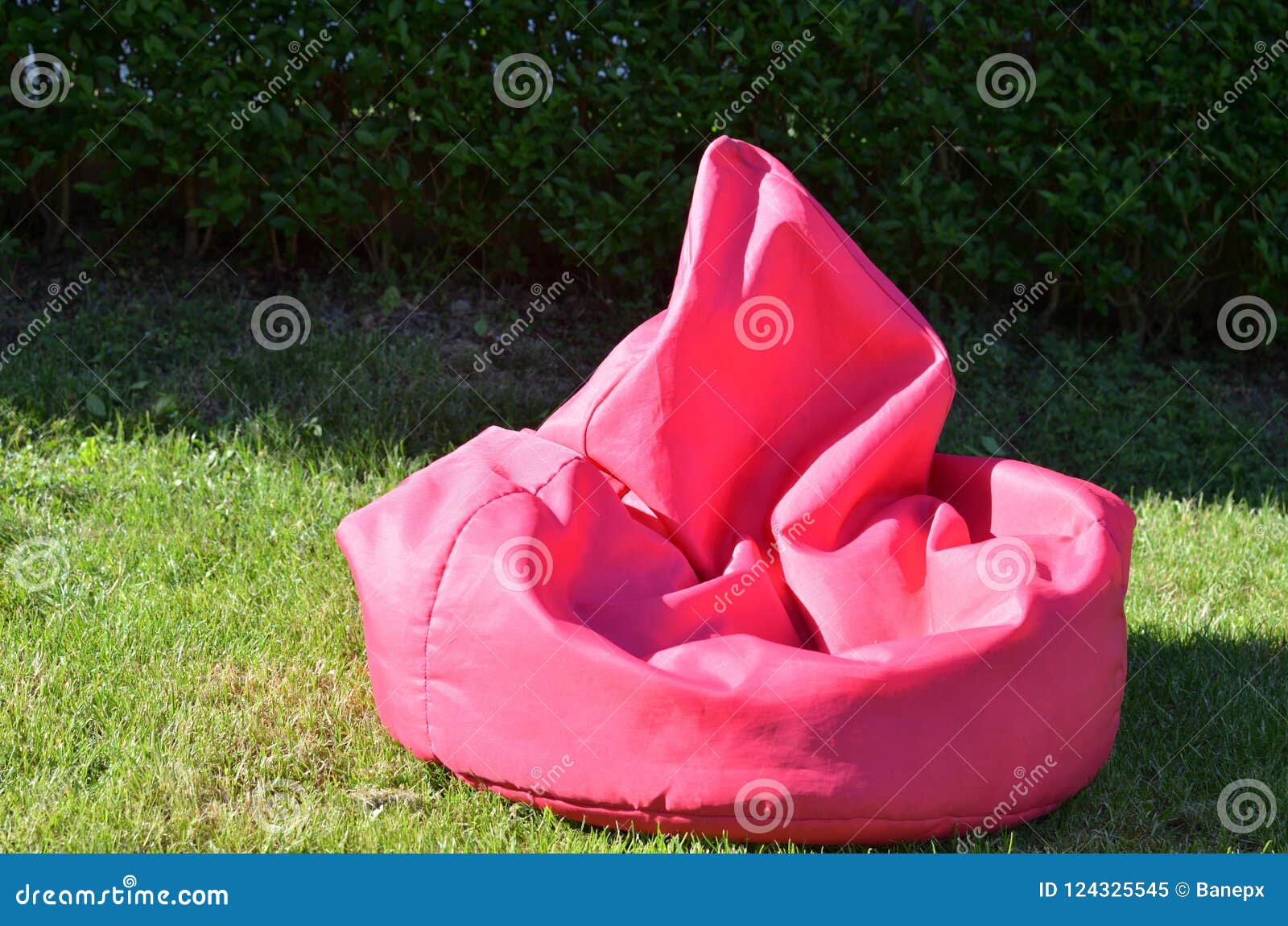 Pink bean bag stock image. Image of cozy, outdoors, green 124325545