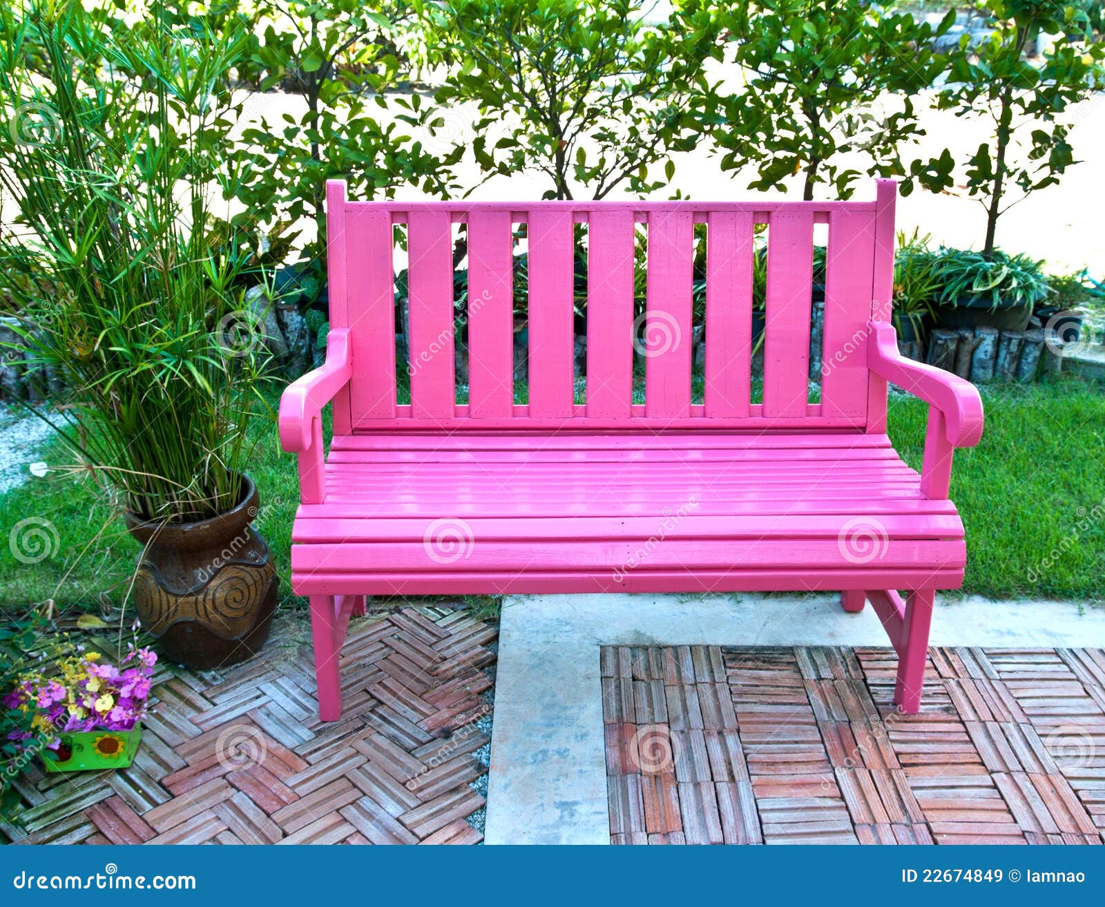 Pink bench in small park stock image. Image of flowers 22674849