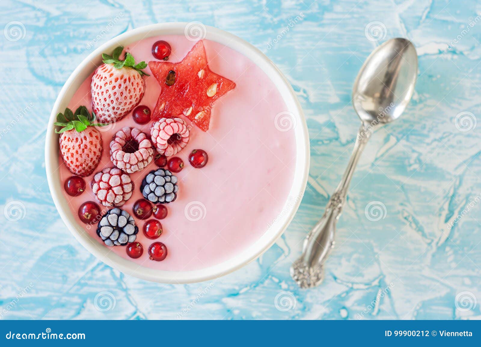 pink berry yogurt smoothie bowl with fruit