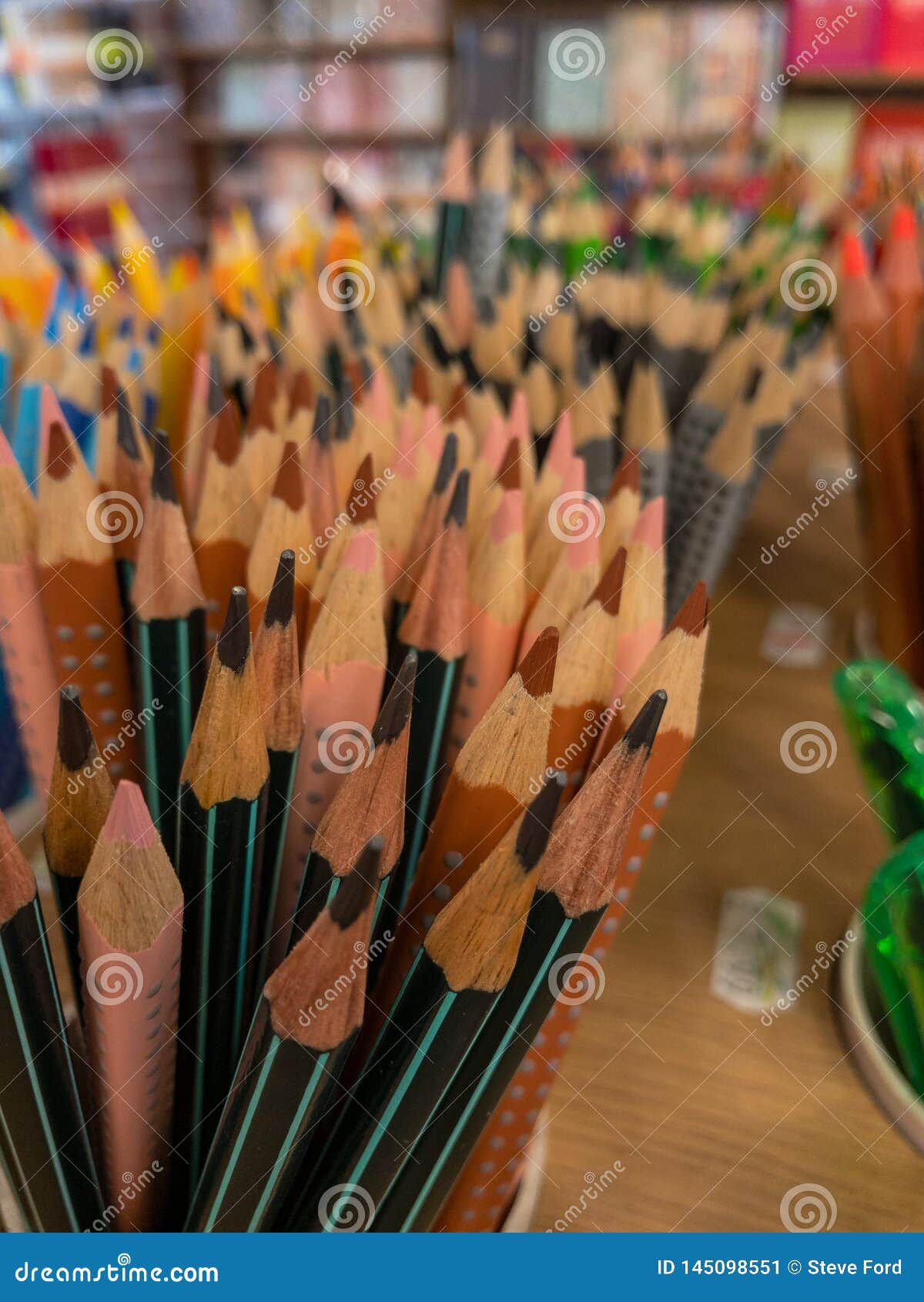 Pink And Brown Coloured Pencils On A Desk In A Shop For Sale The