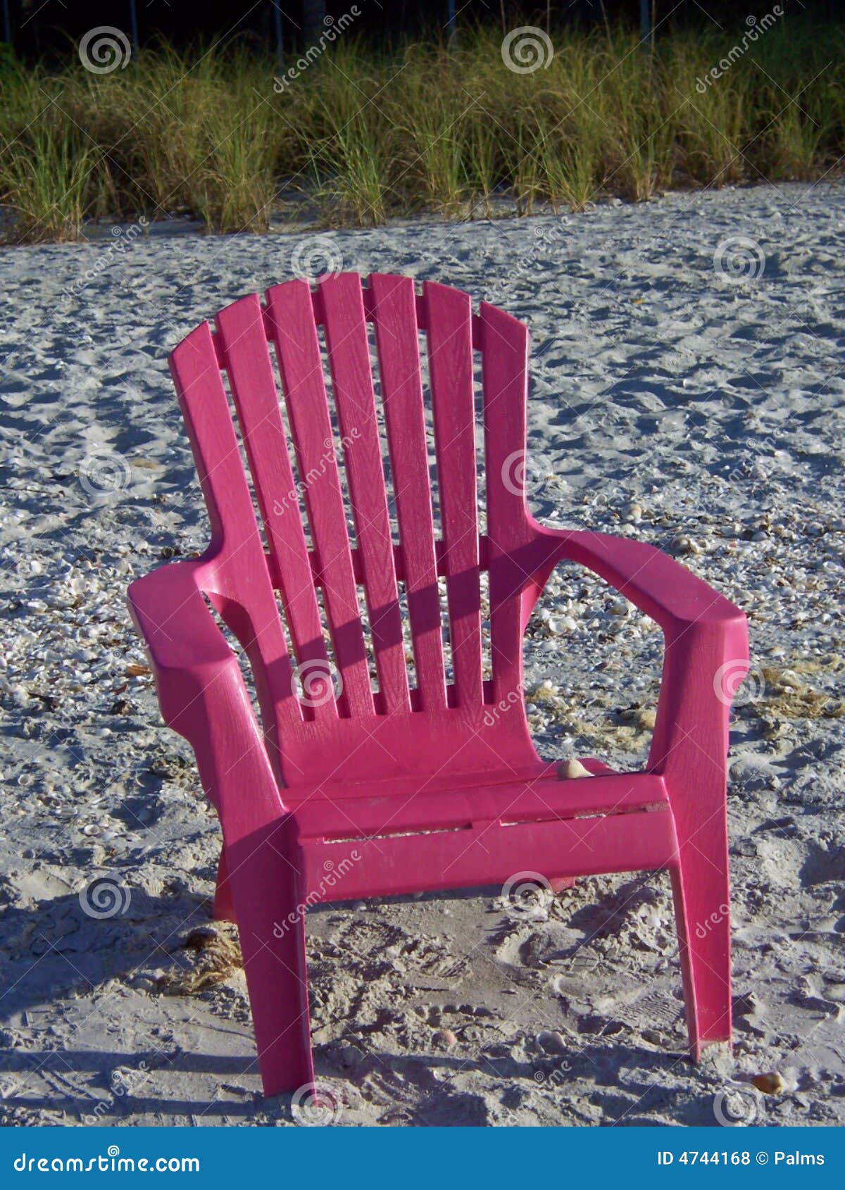 Pink chair on a beach stock photo. Image of colors, beach