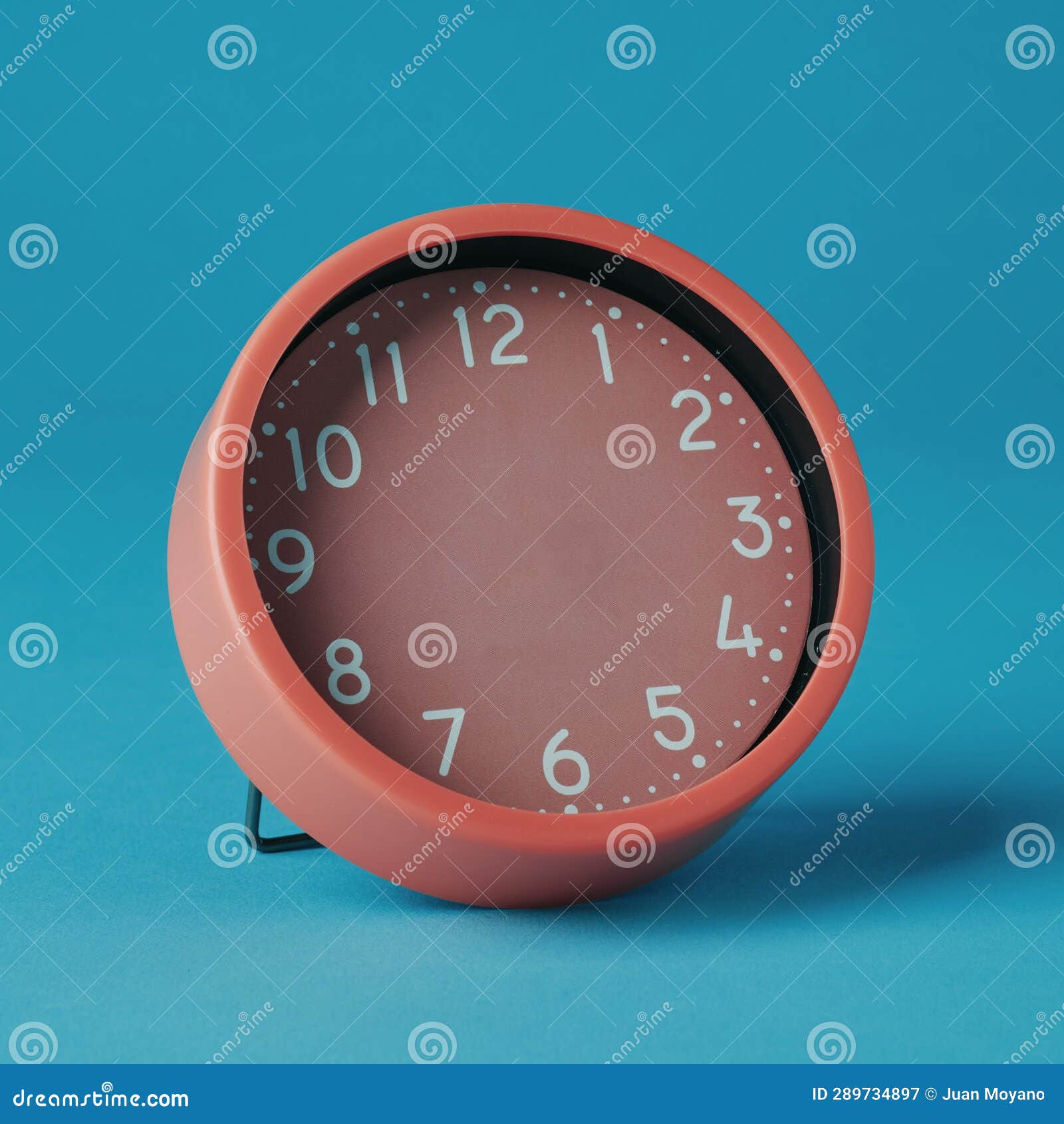 Pink Clock without Hands on a Blue Background Stock Image Image of