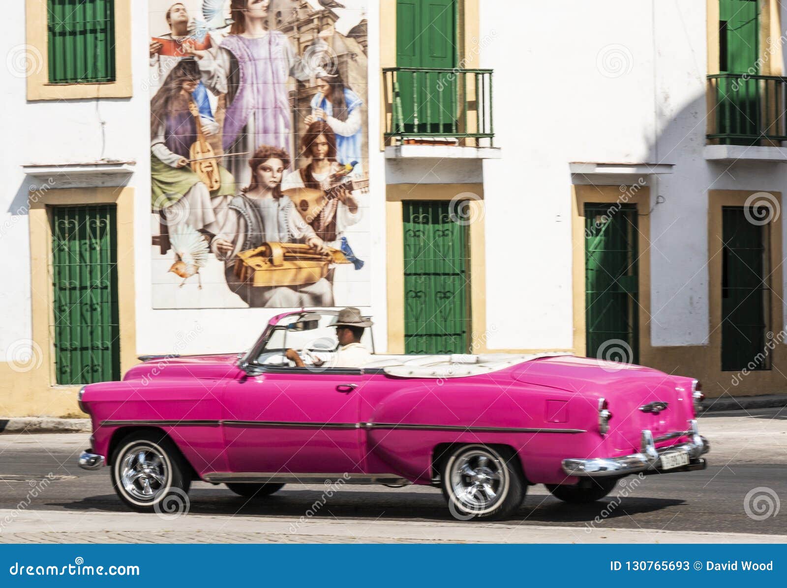 Pink Convertible Passing Mural in Havana Cuba Editorial Stock - Image of movement, cuba: