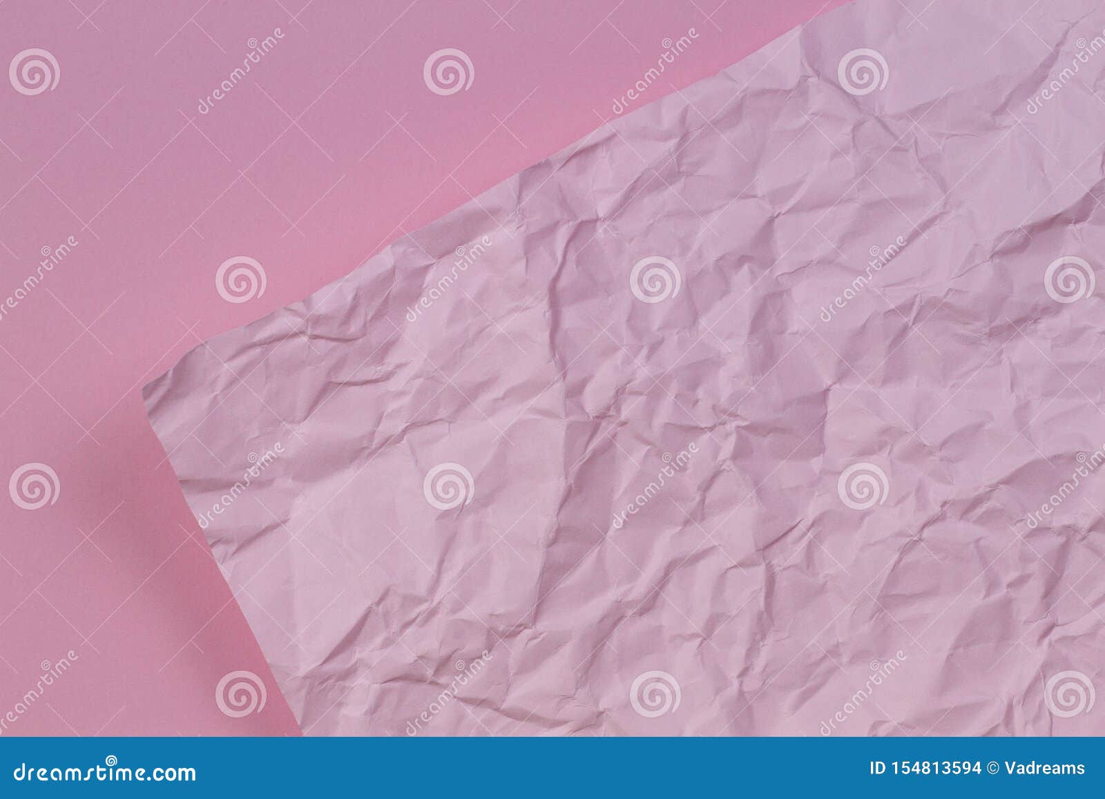 Pink Crumpled Wrinkled Paper Over Blank Pink Paper Texture Background