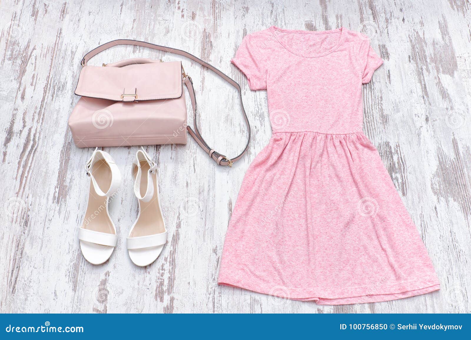 Pink Dress, White Shoes and a Beige Bag. Fashionable Concept Stock