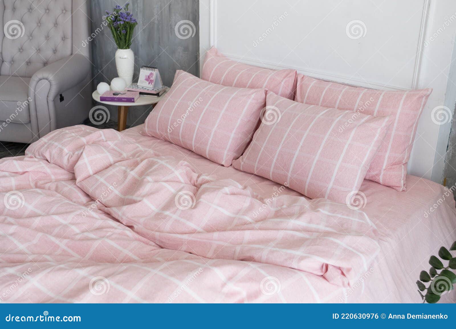 Pink Ecologycal Linen on Bed in Modern Home Interior. Daylight Stock