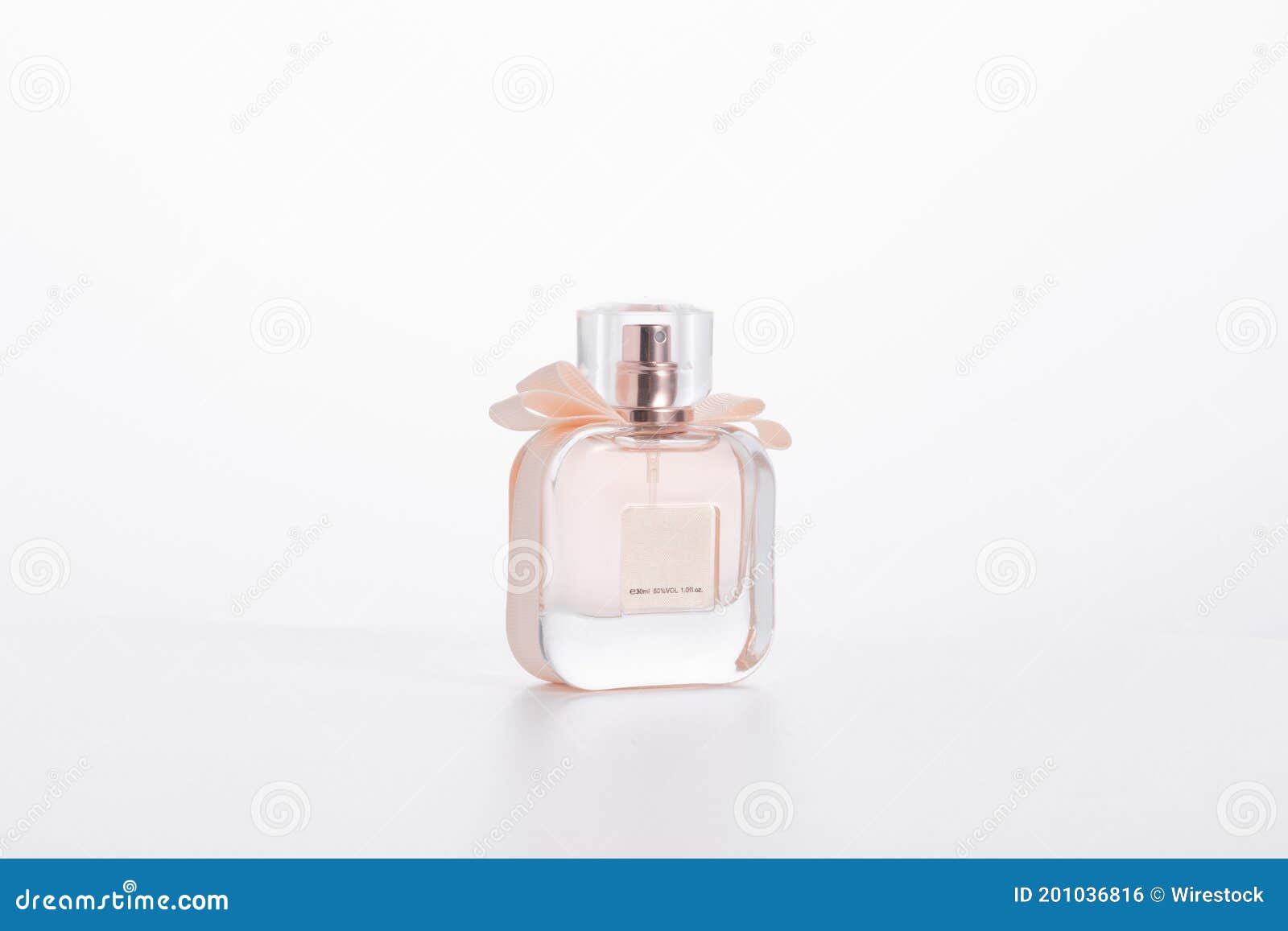 Pink Elegant Perfume Bottle with a Bow Isolated on a White Background