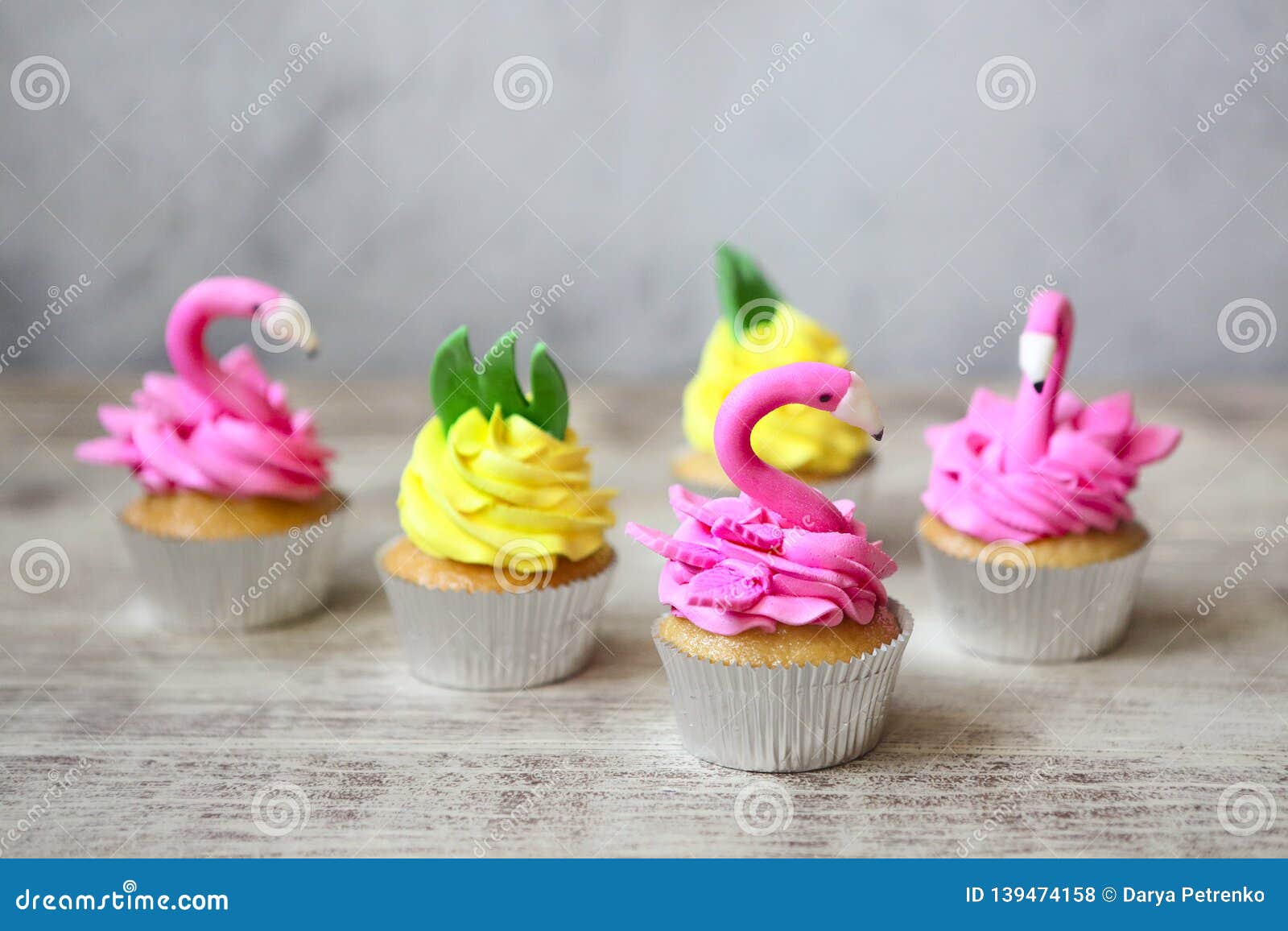 Pink Flamingo And Pineapple Cupcakes For The Birthday Party Stock
