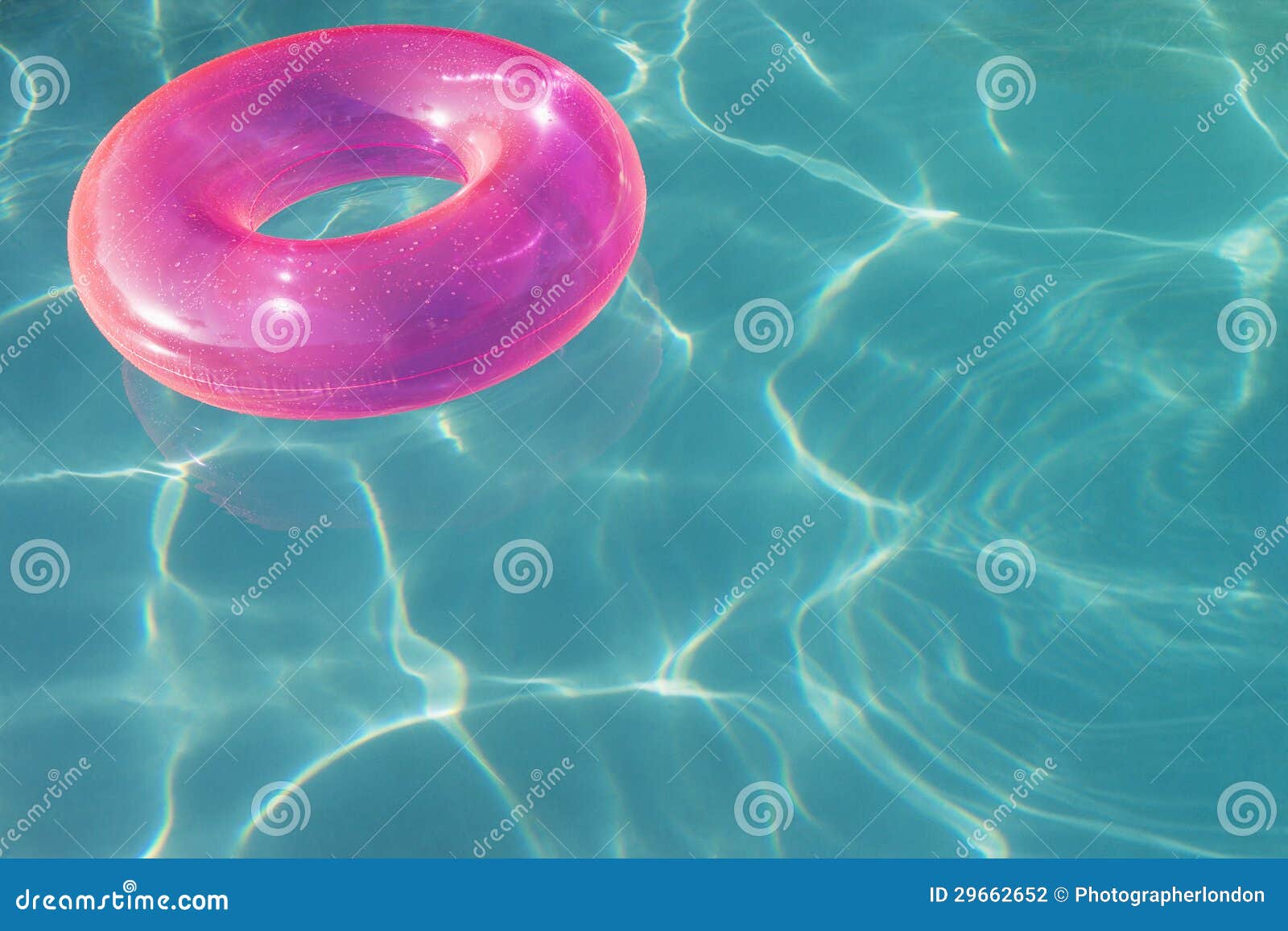 Pink Float Tube Floating on Water Stock Photo - Image of daylight ...