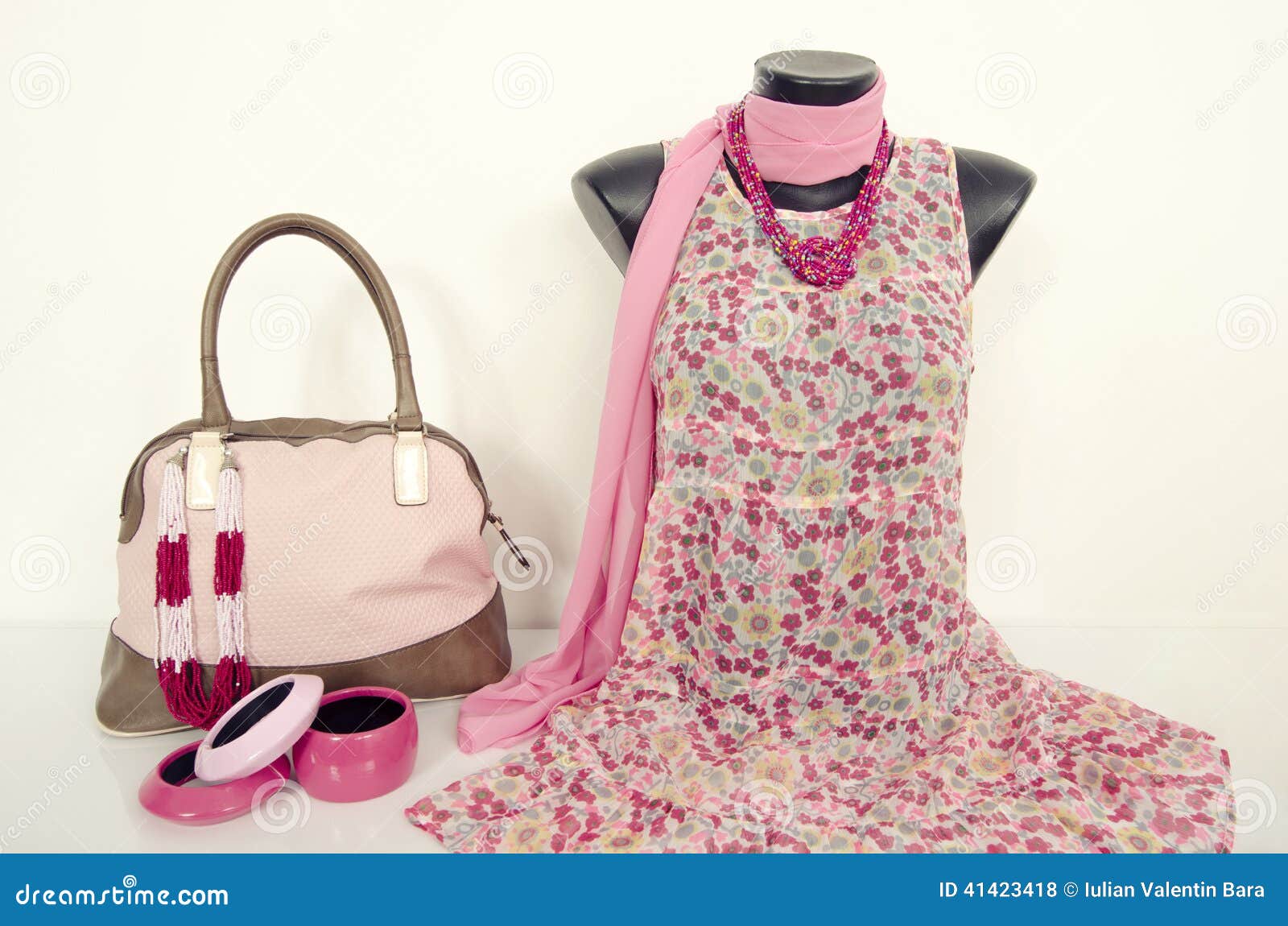 Pink Floral Dress on Mannequin with Matching Accessories. Stock Photo ...