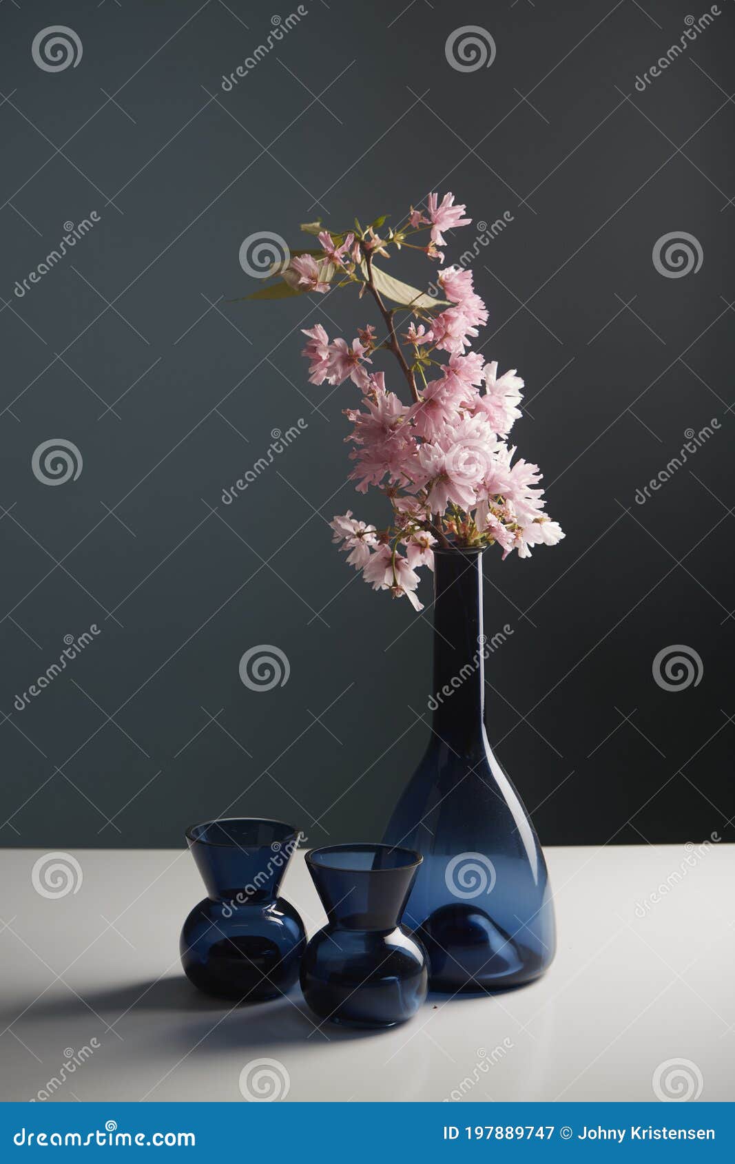 Pink flower in a blue vase stock image. Image of flower 197889747