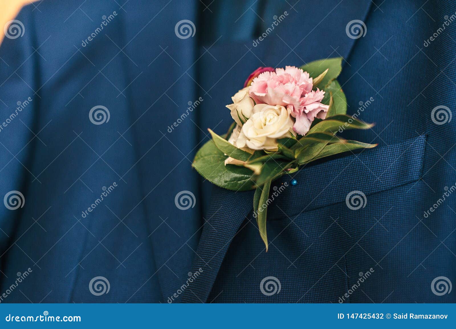 Pink Flowers in the Buttonhole of the Groom Stock Photo - Image of ...