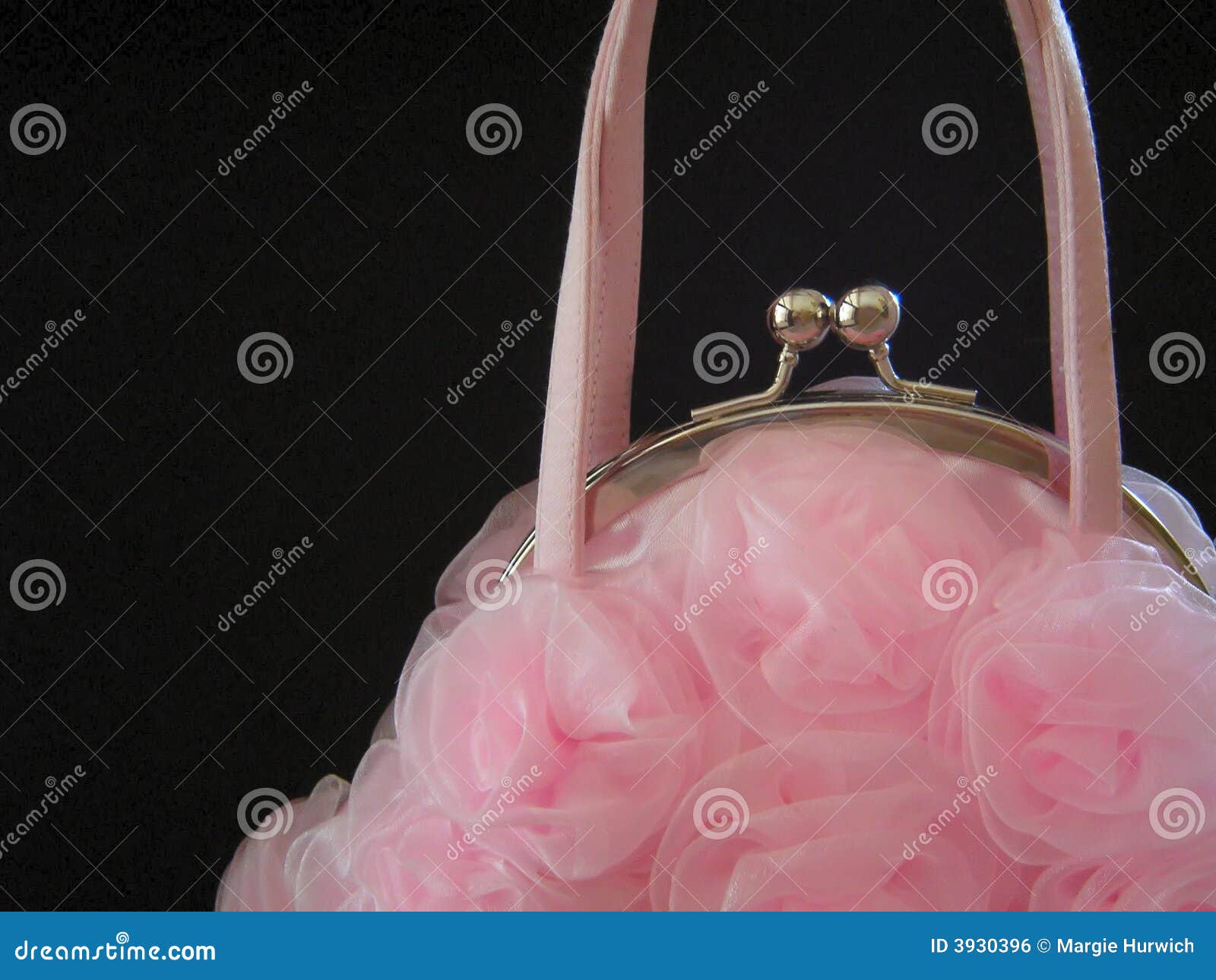 pink frilly purse