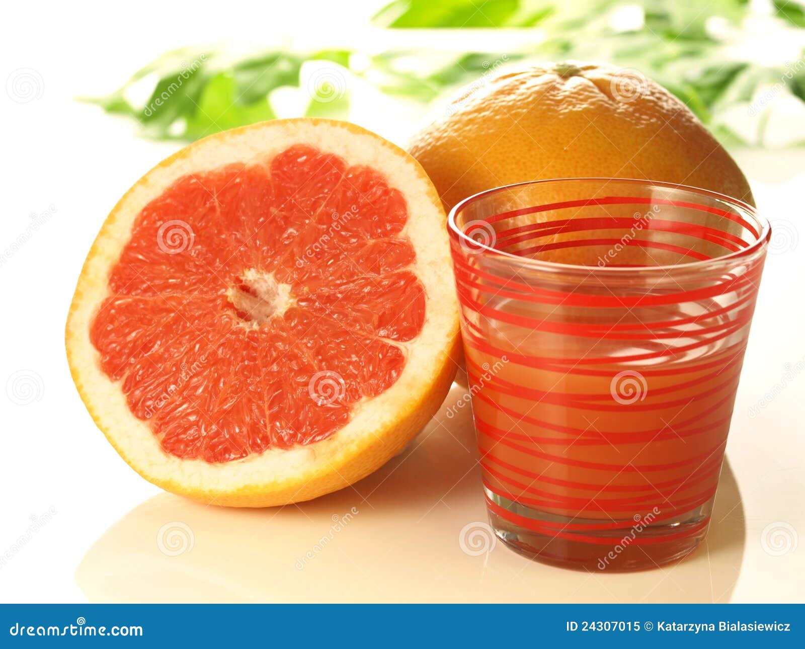 Pink grapefruit with juice stock image. Image of dessert 24307015