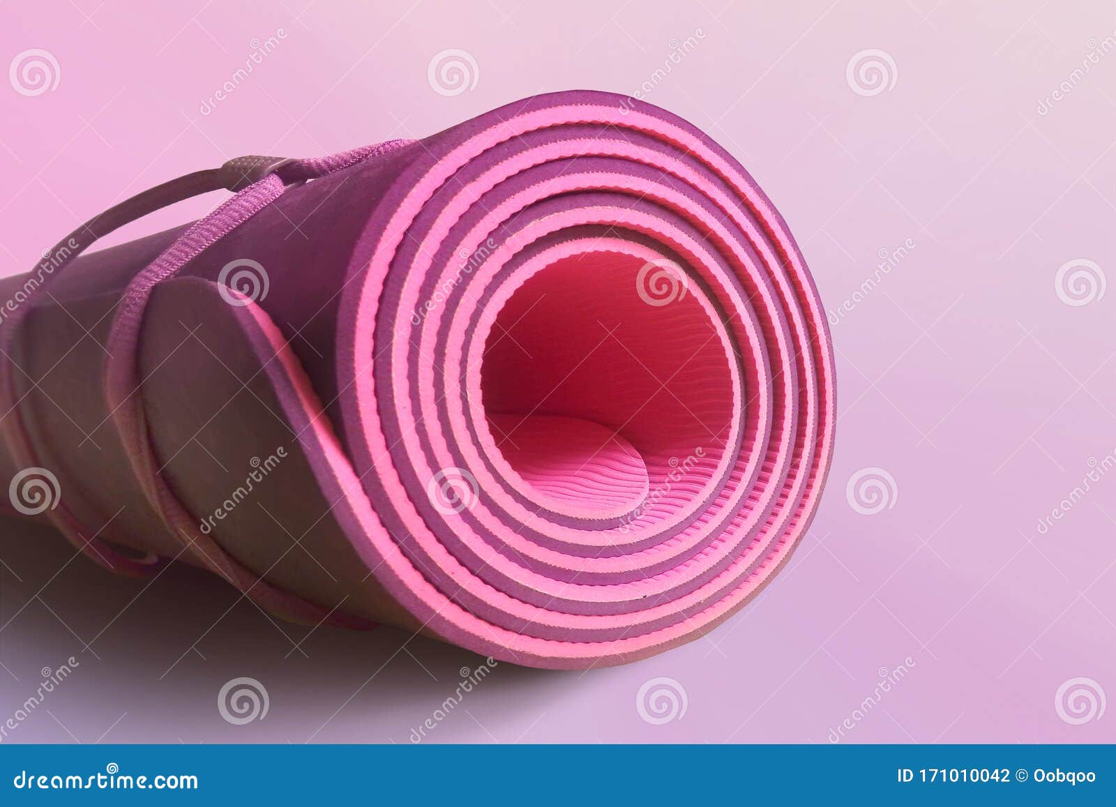 Pink Half Rolled Yoga Mat on Magenta Background. Yoga and Pilates ...