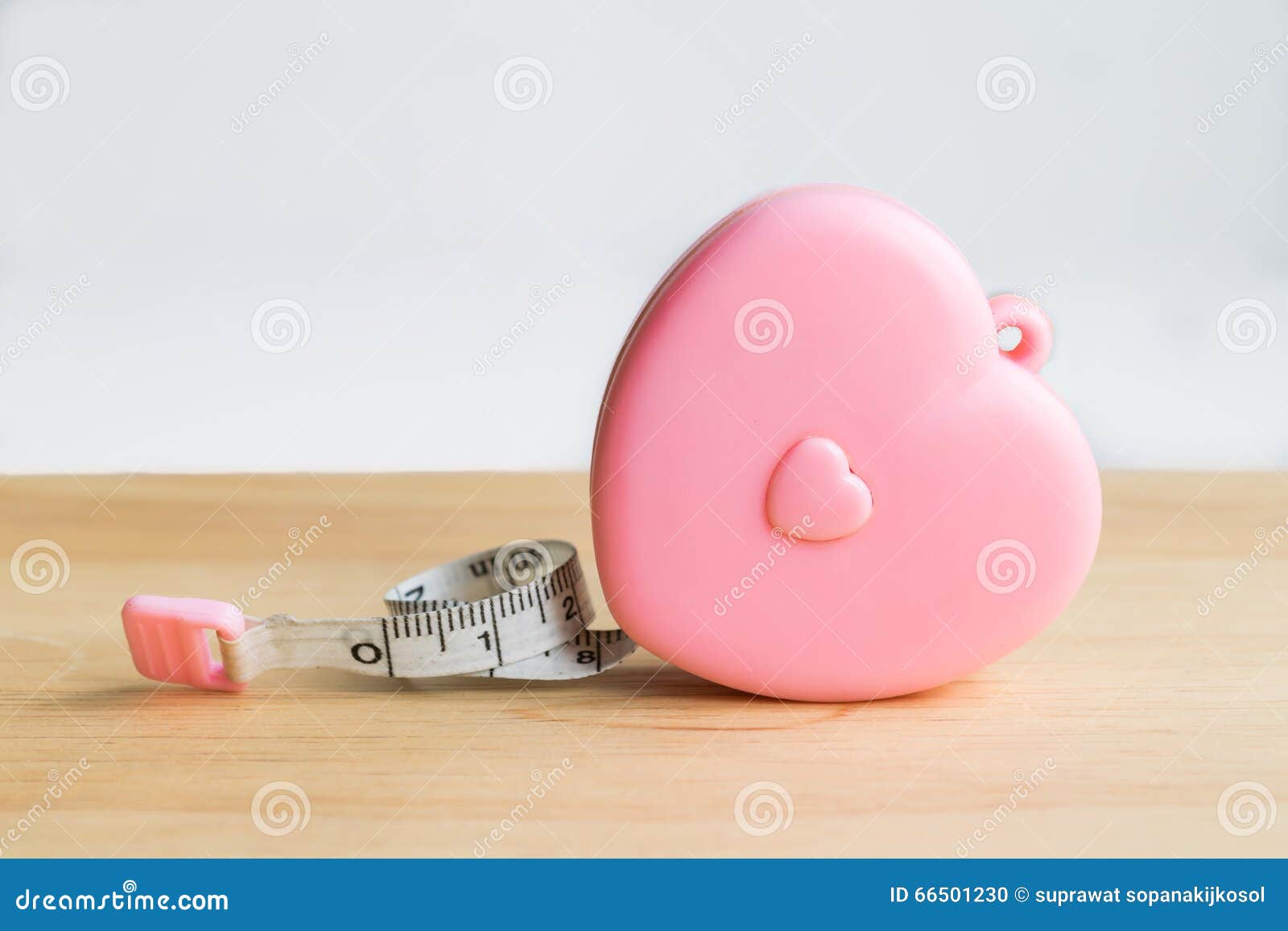 Pink Measuring Tape Isolated On White Background Stock Photo, Picture and  Royalty Free Image. Image 61847596.