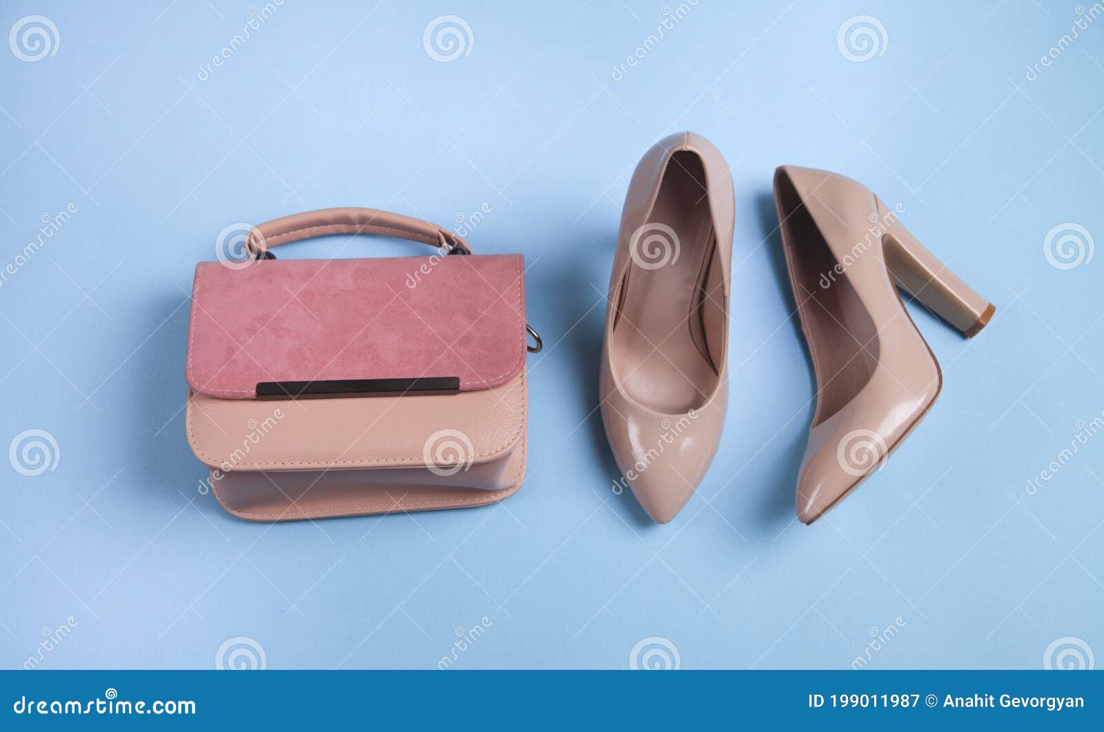 Pink High Heeled Shoes and Bag on Blue Background Stock Image Image