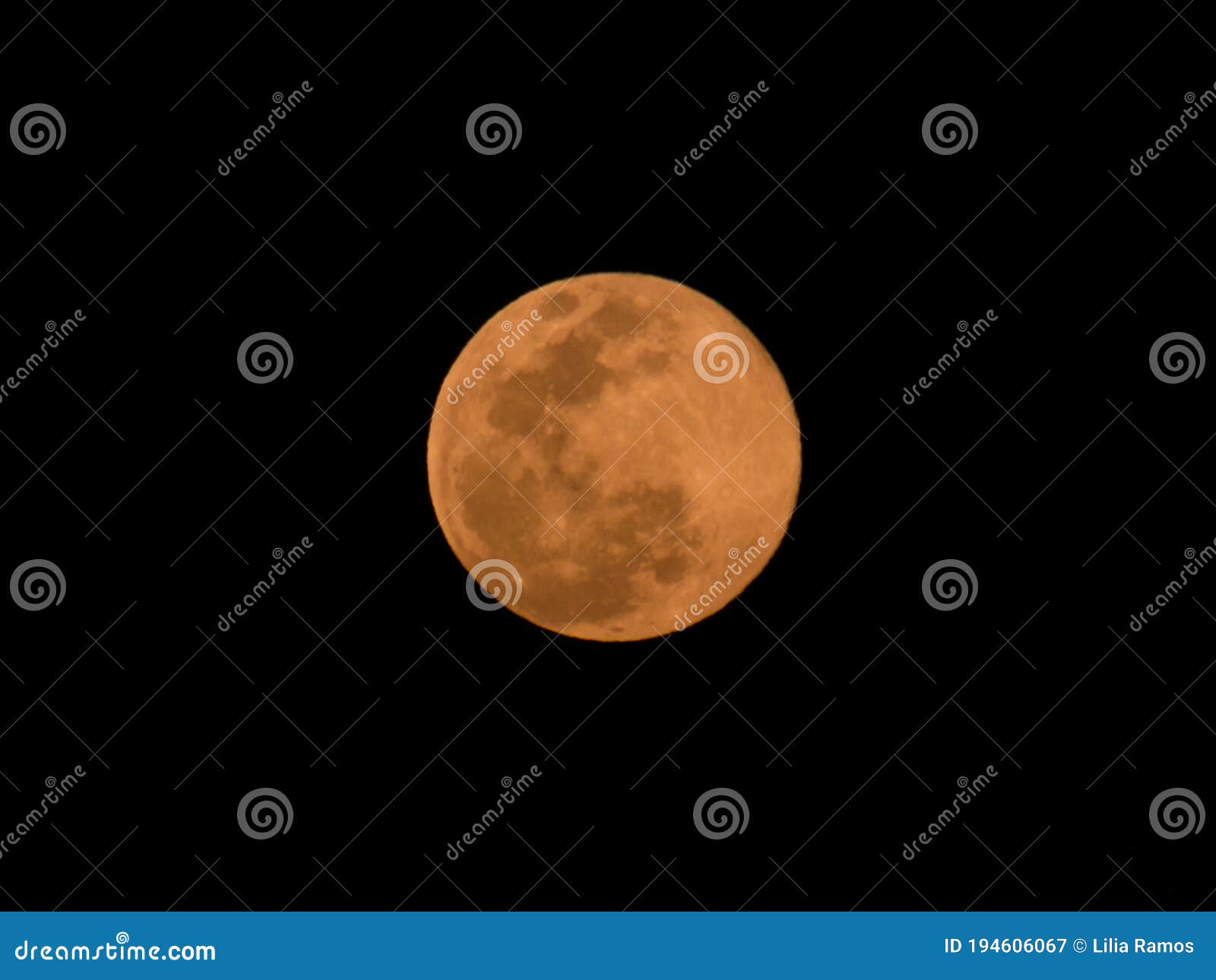 pink moon in a clear and deep sky