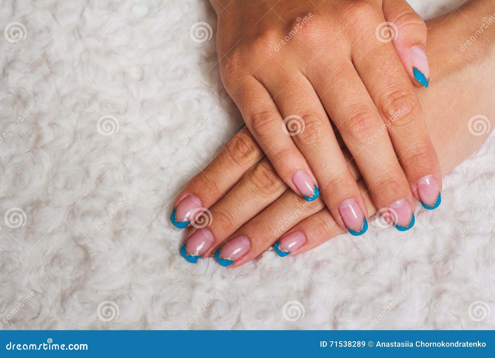 Women`s hand with pale pink gel polish and black fragments on nails.  Women's manicure with pink lacquer and black abstract design. Quail egg  design Stock Photo | Adobe Stock