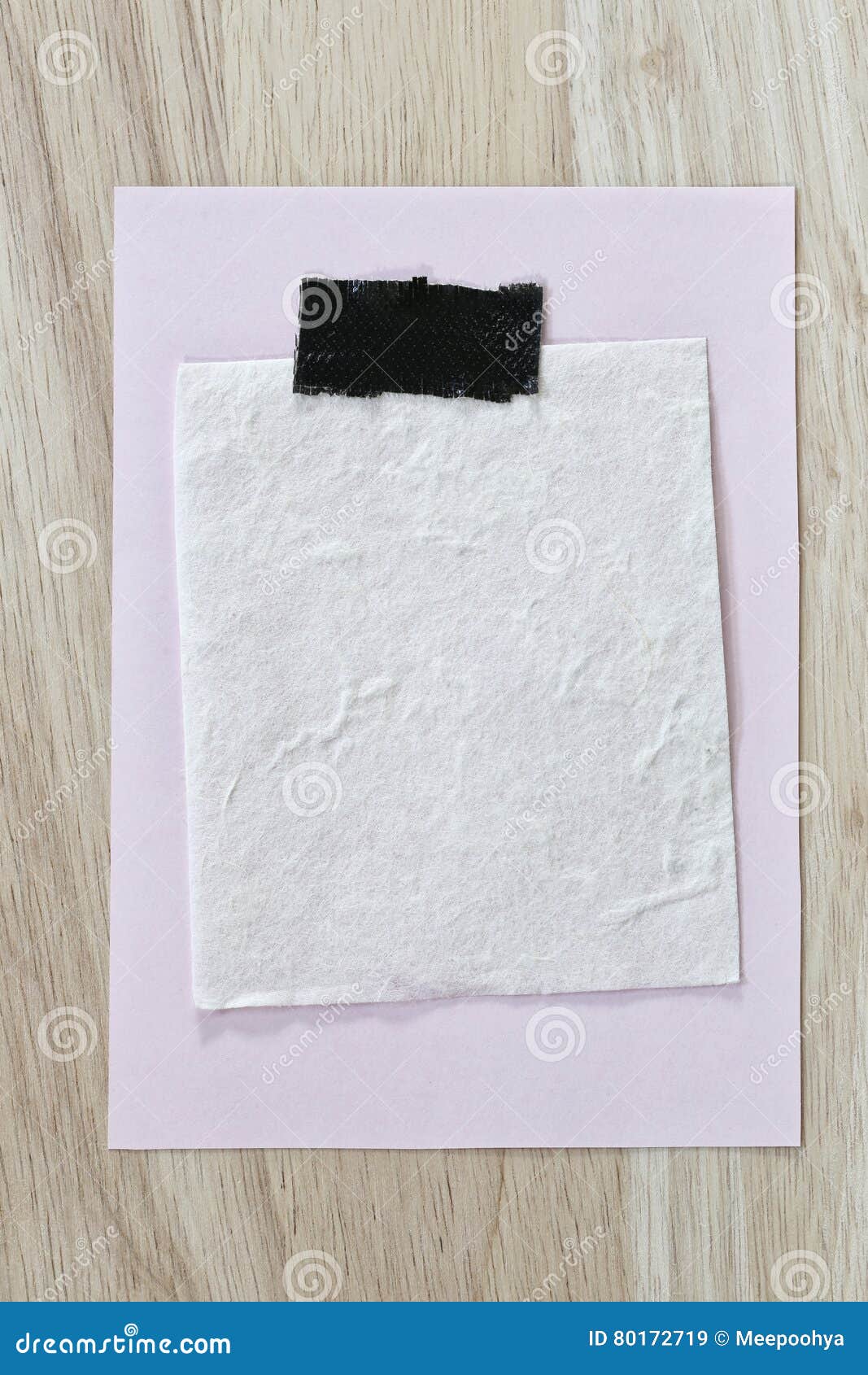 Pink Notepad Paper of Empty and Copy Space on Wooden Background. Stock