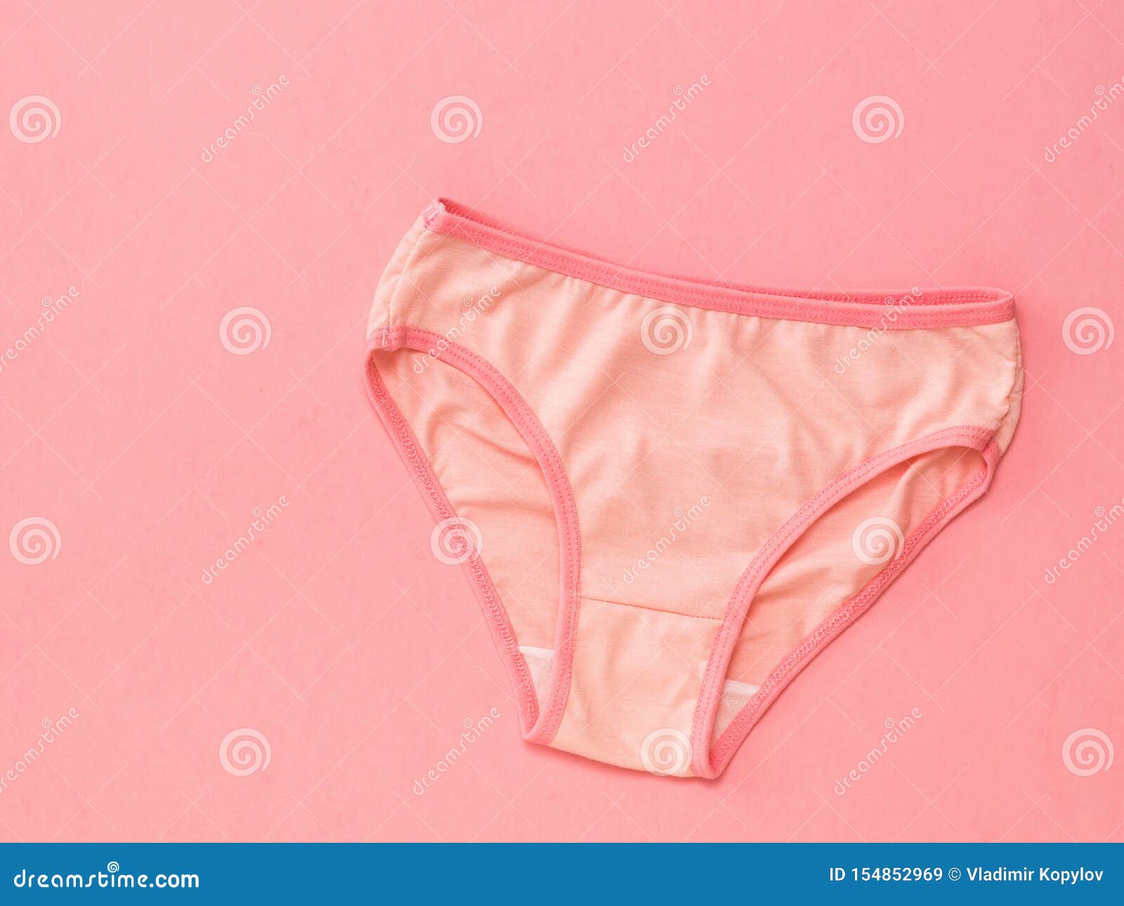 Pink Panties with Red Border on Pink Background. the Concept of