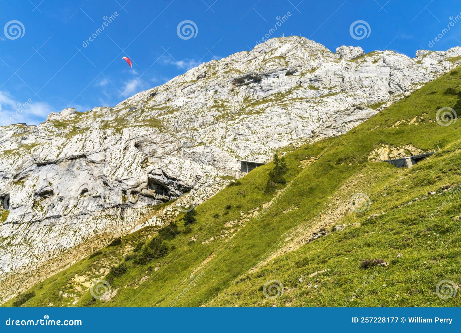 pink parasail rock cliffs pastures climbing mount pilatus lucerne switzerland