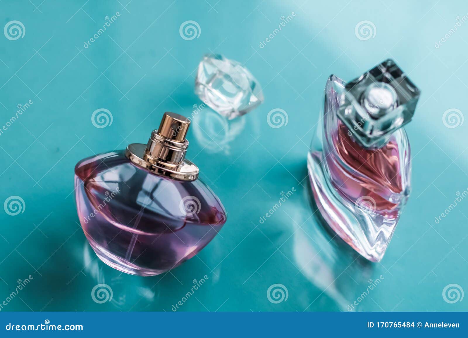 Pink perfume bottle on glossy background, sweet floral scent, glamour  fragrance and eau de parfum as holiday gift and luxury beauty cosmetics  brand design, Stock image