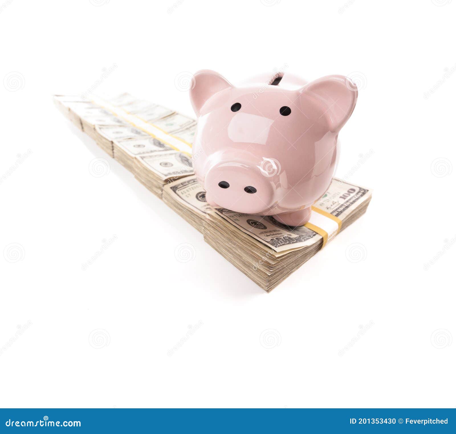 pink piggy bank on row of hundreds of dollars stacks  on a white background