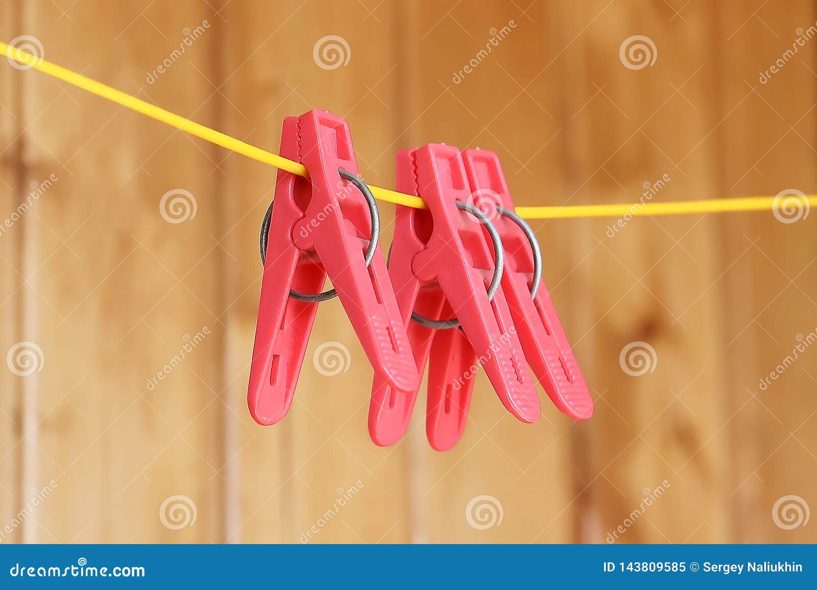 Pink Plastic Clothespins Hanging on a Rope Yellow Stock Image Image of wash, hanging 143809585