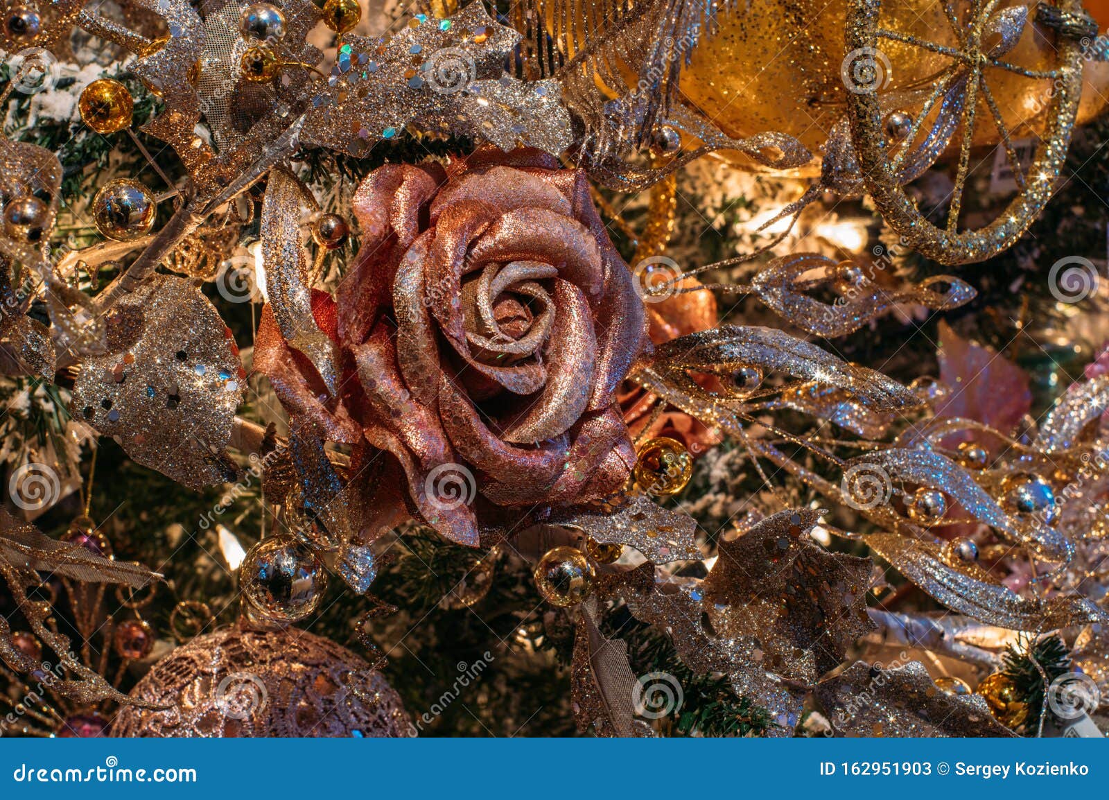 Pink Rose, Christmas Tree Decorations, Yellow and Gold Background Stock
