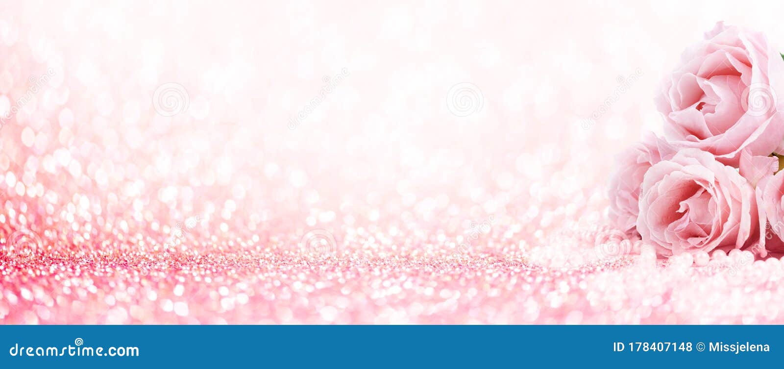 pink roses bouquet and pearls on abstract blur pastel background. wedding flowers and bright bokeh glitter backdrop