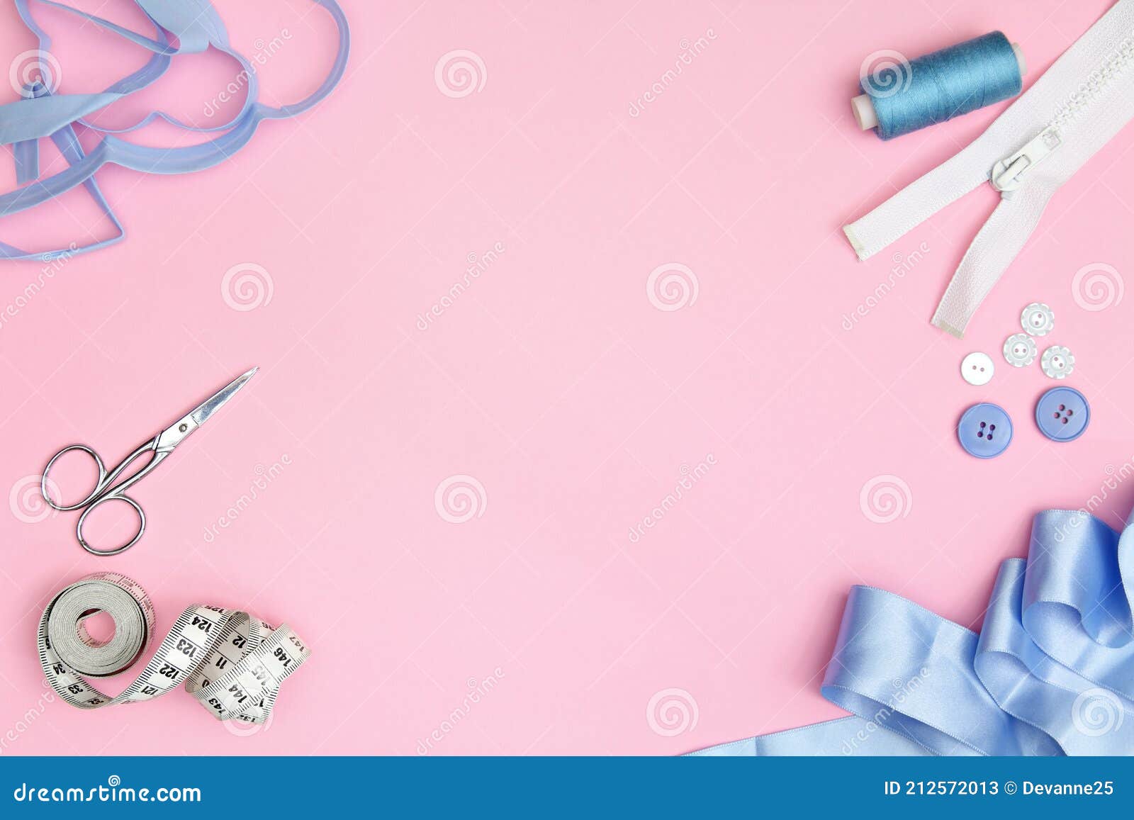 Pink Sewing Template with Accessories on a Pink Background Needles, a