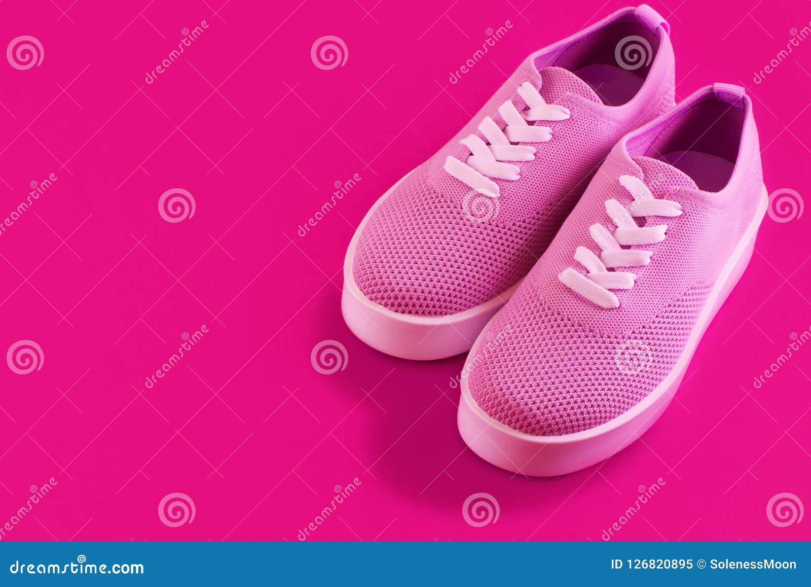 Pink Sneakers On A Bright Fuchsia Background. Stock Image - Image of ...