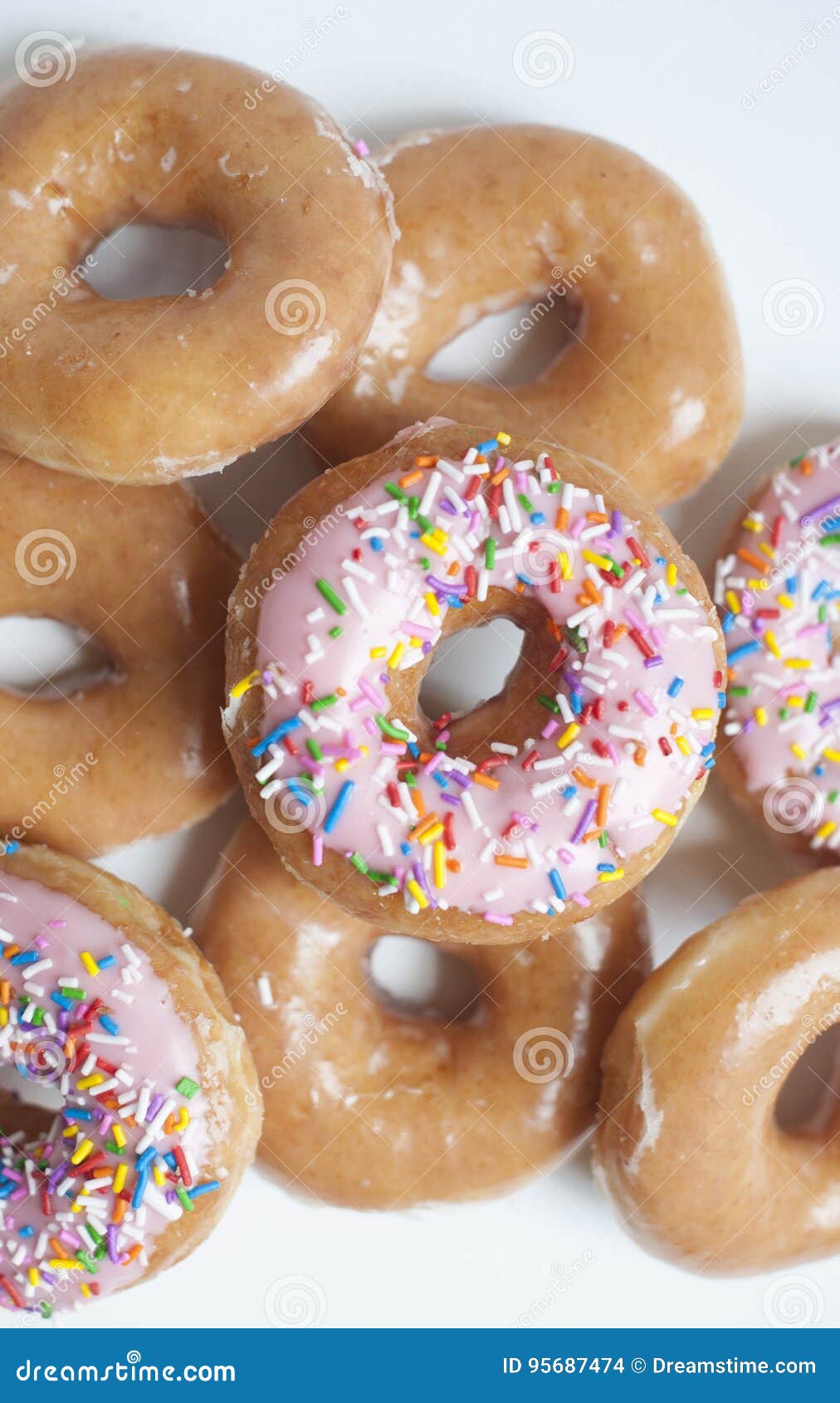 Pink sprinkle donuts stock photo. Image of donuts, pile 95687474
