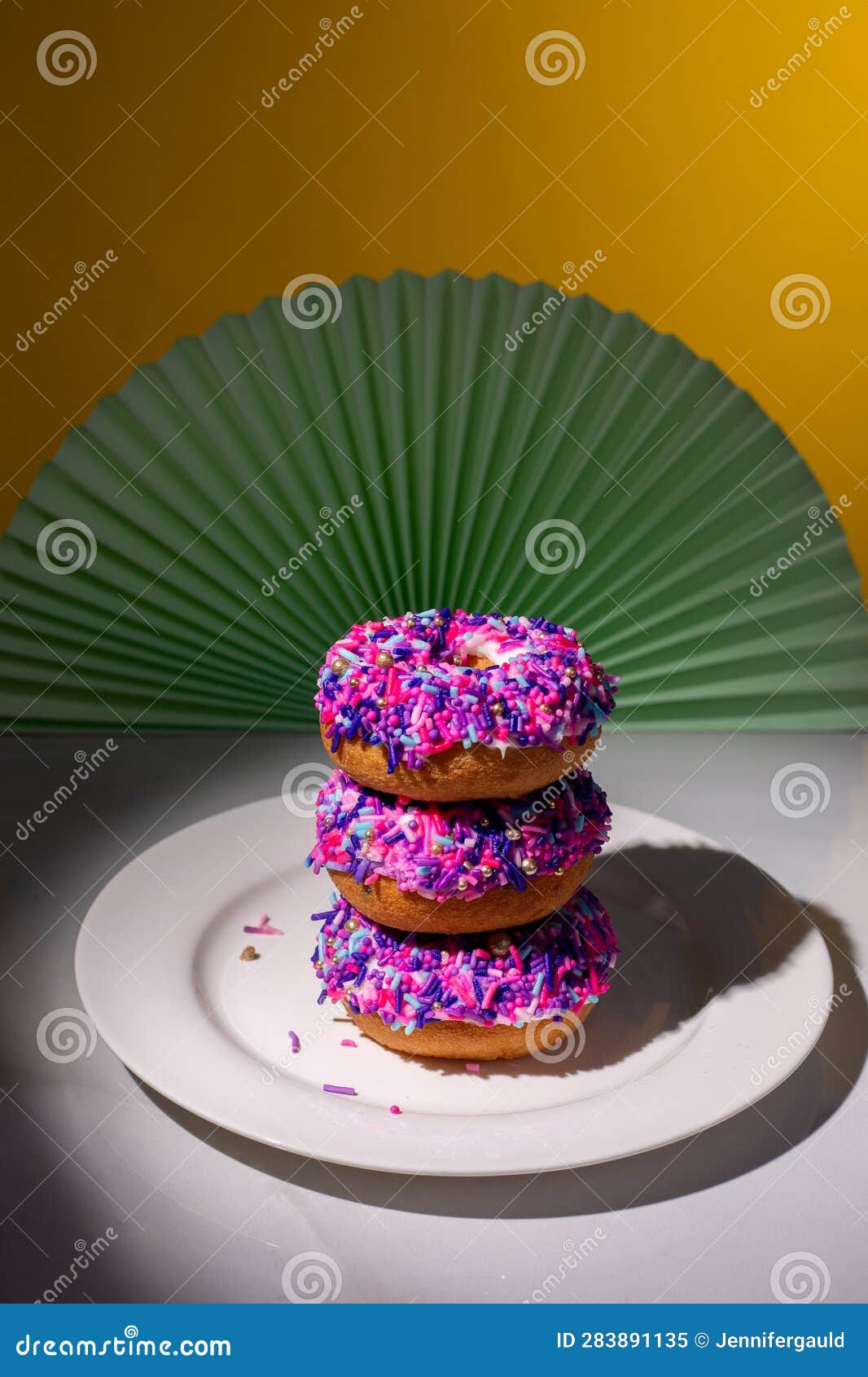 Pink Sprinkle Donuts in a Spotlight from Above Stock Image Image of