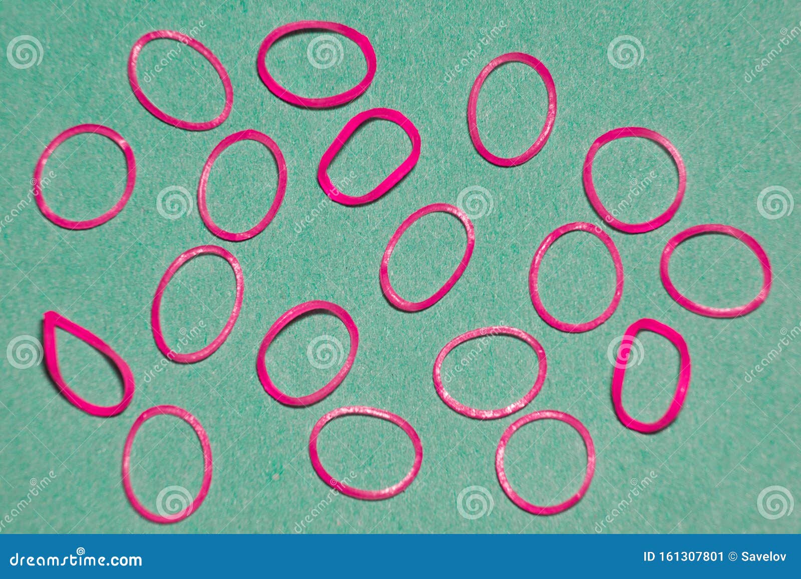 Pink Thin Rubber Bands for Hair on Blue Craft Paper is Close Stock Image -  Image of fashion, accessories: 161307801