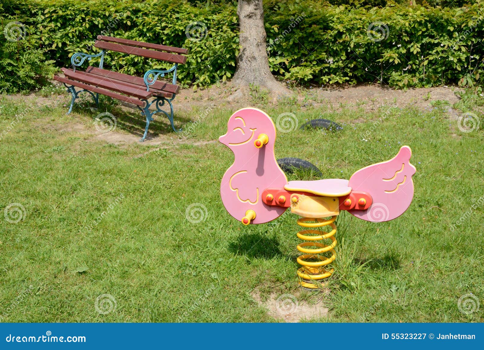 Pink Toy and Bench on Playground Stock Image Image of grass, bench
