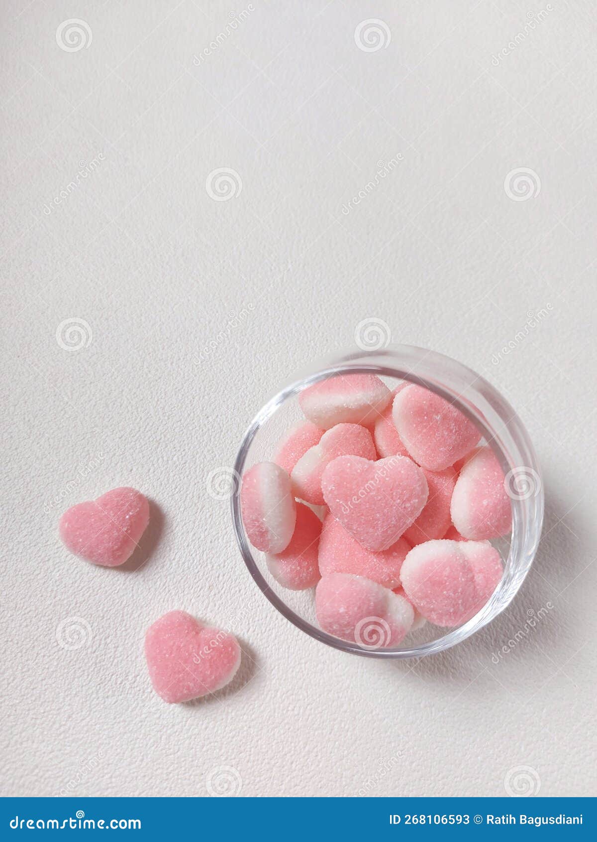 pink and white gummy hearts with strawberry flavored.