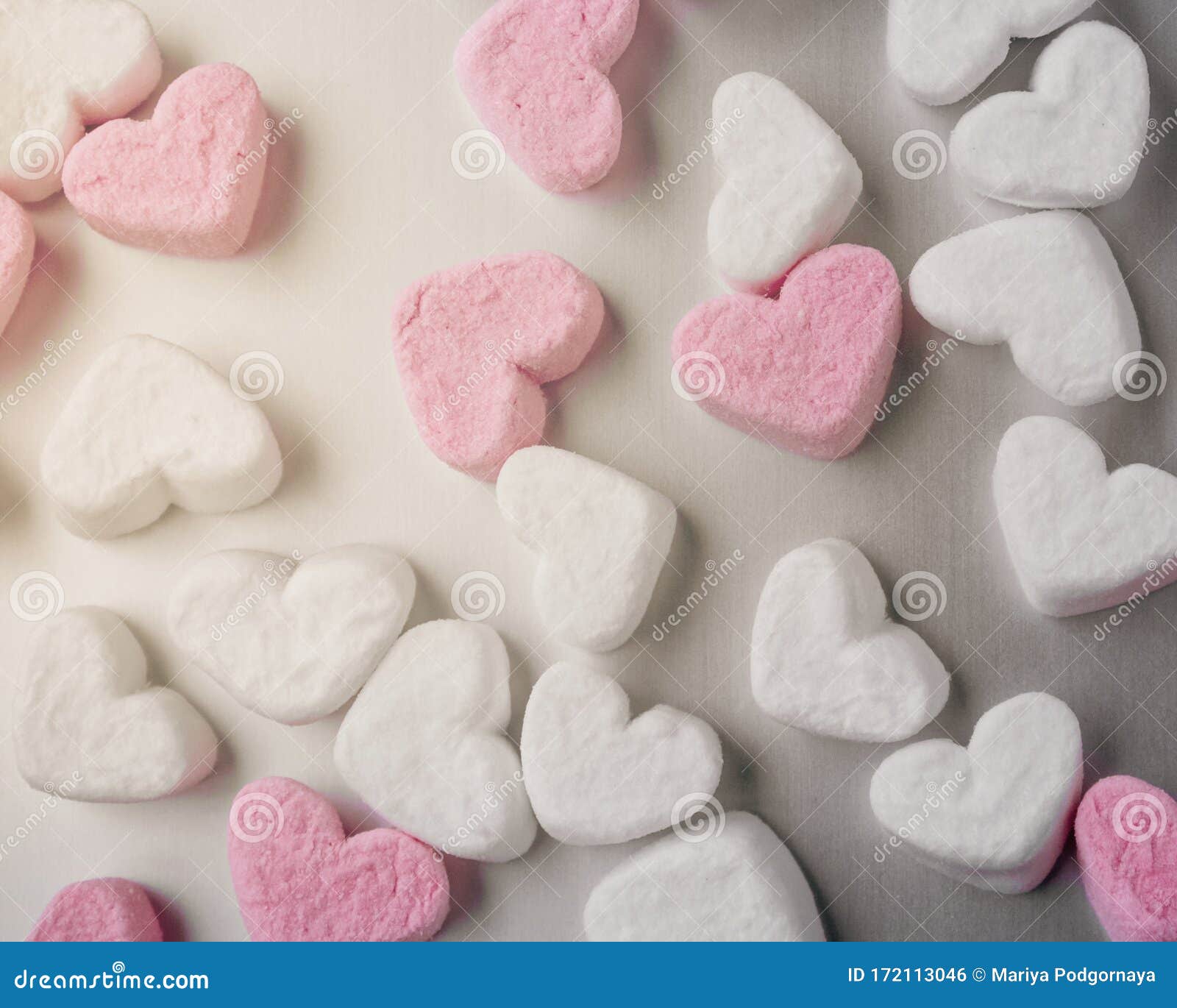 Pink and White Heart-shaped Marshmallows Evenly Laid Out on Gray Aluminum  Background Stock Photo - Image of shape, heart: 172113046