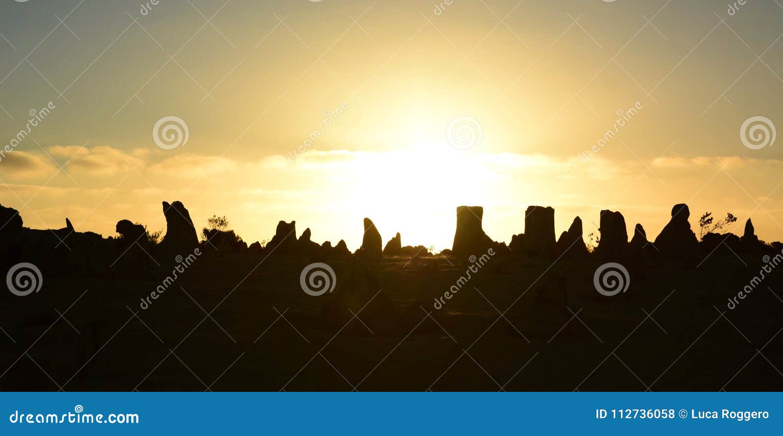pinnacles desert silhouettes at sunset. nambung national park. cervantes. western australia. australia