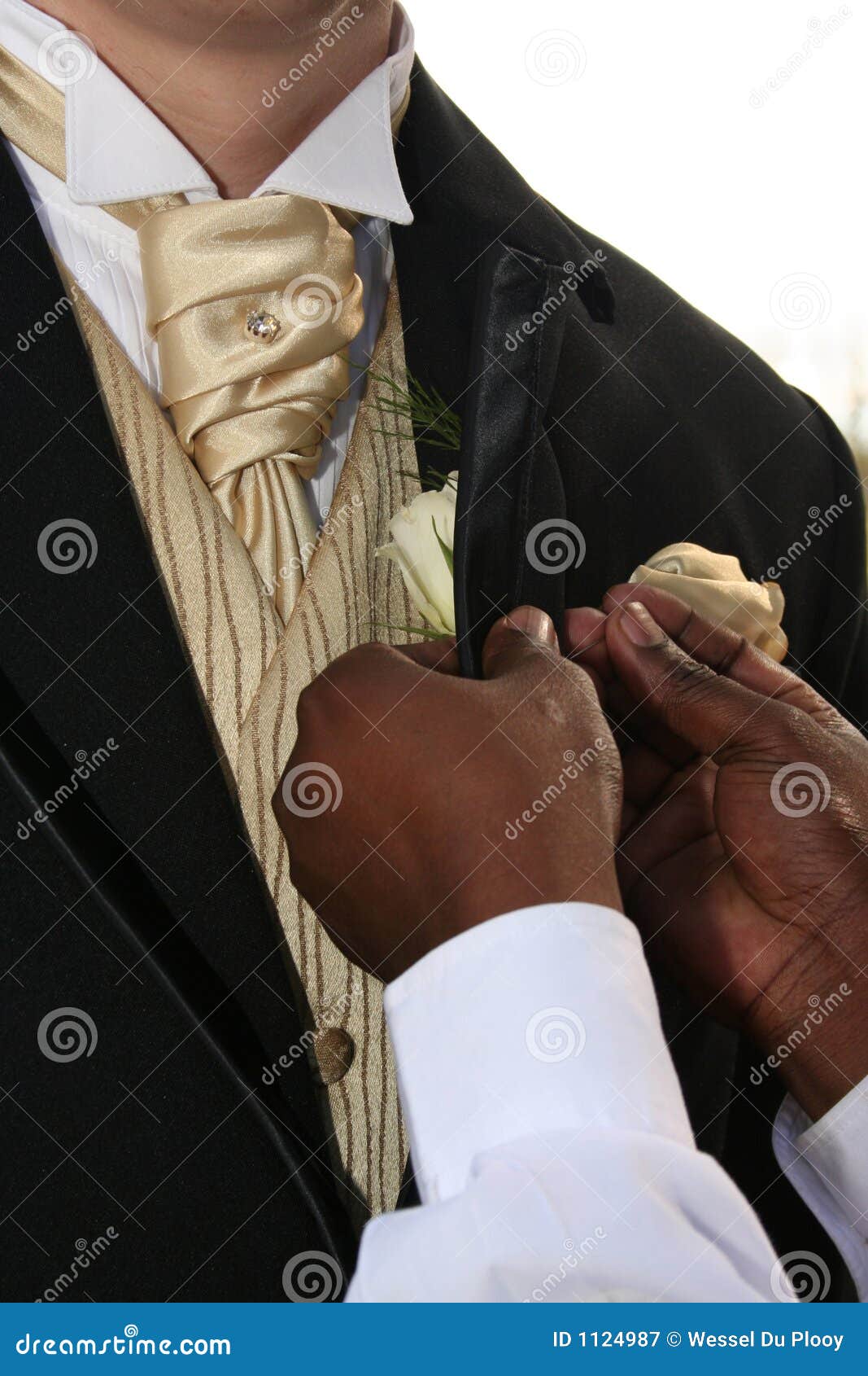 pinning rose on suit