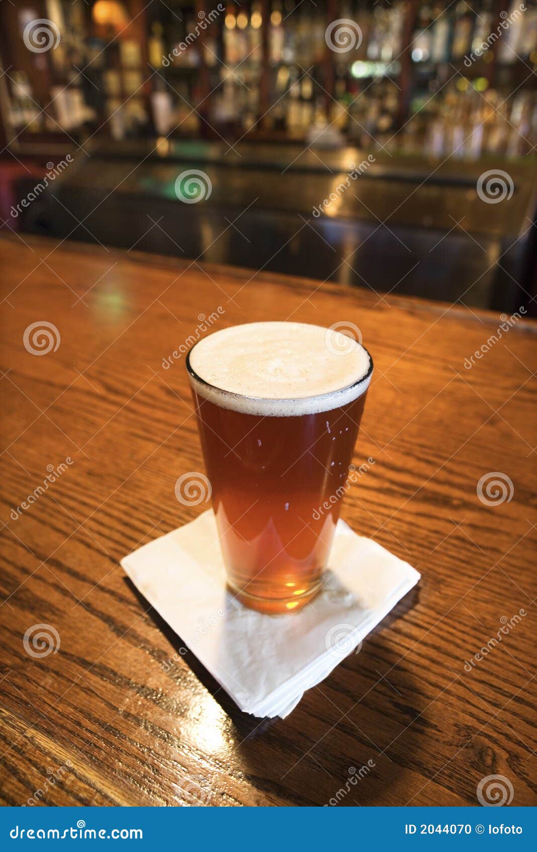 Pint of beer on bar. stock photo. Image of color, nightlife - 2044070