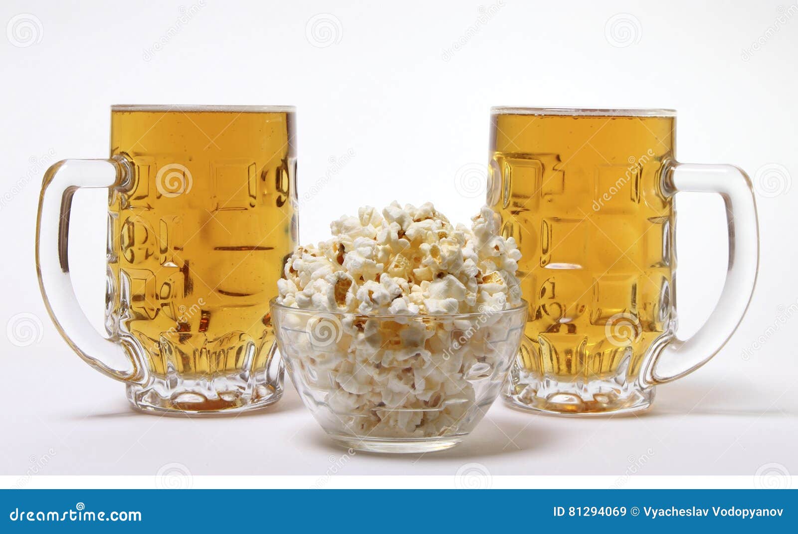 Pint of Cold Light Beer and Salty Popcorn Stock Image - Image of close