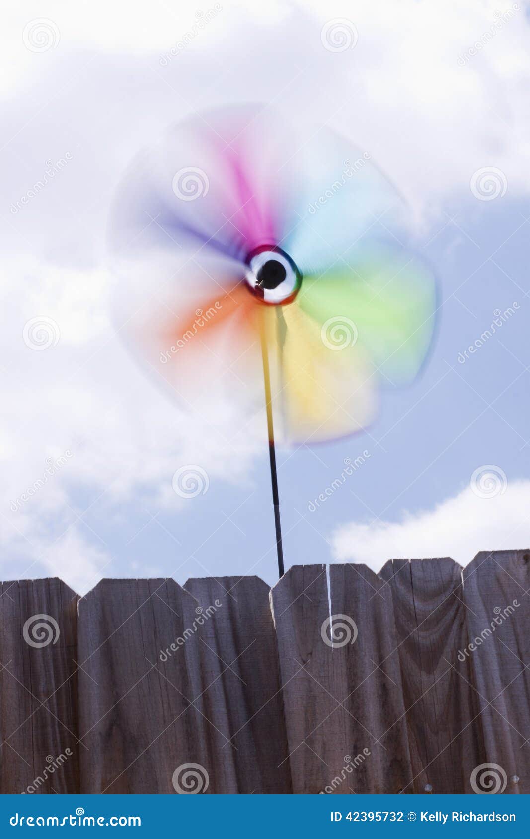 Pinwheel spinning in sky stock photo. Image of pinwheel 42395732