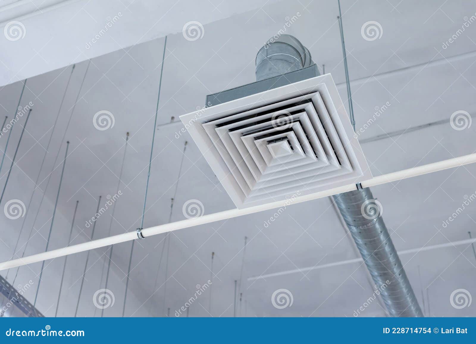 Supply and Exhaust Ventilation System on Ceiling of a Commercial Room or Warehouse Stock Photo