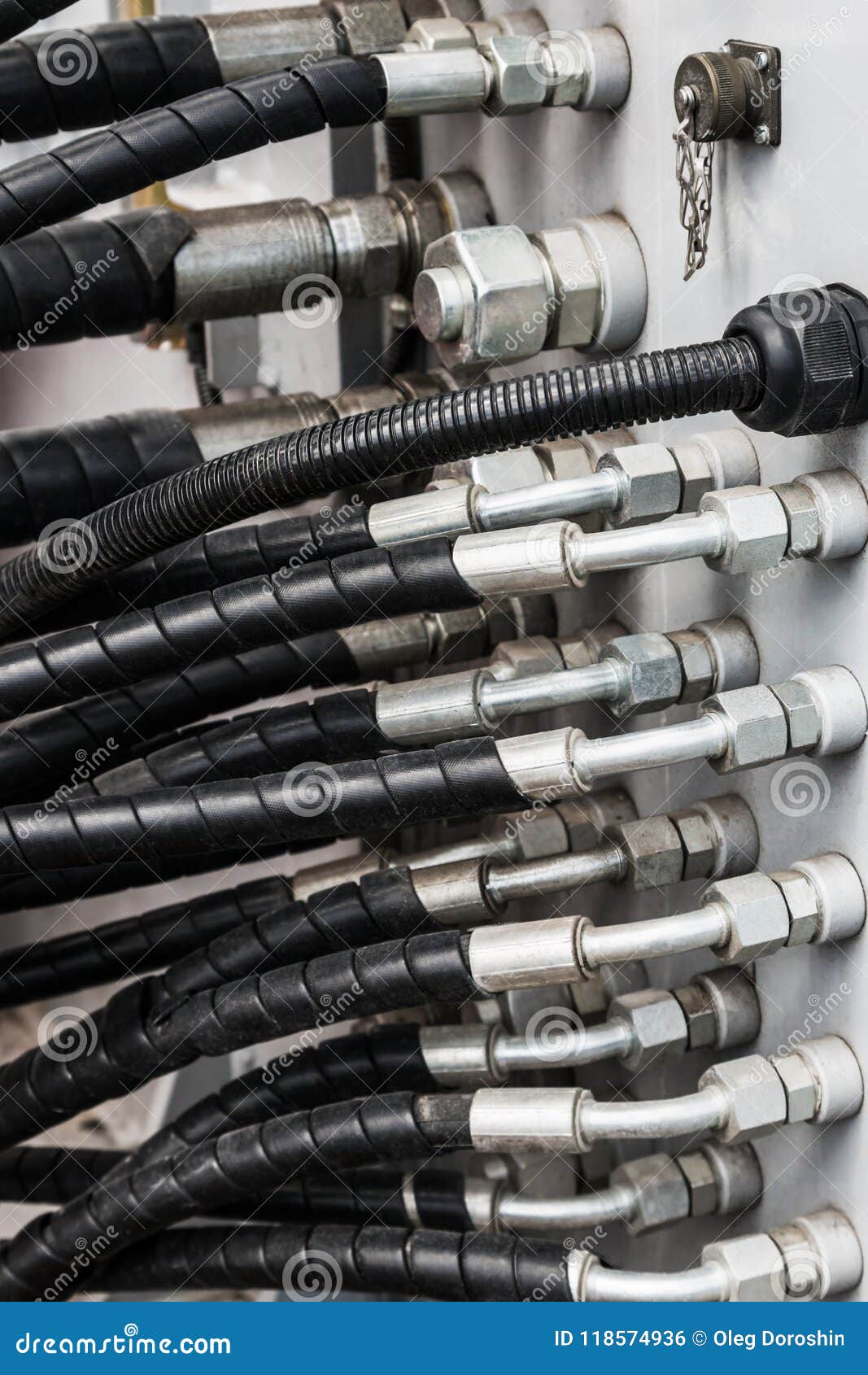 Pipes and the Hydraulic System of the Tractor or Excavator Stock Photo