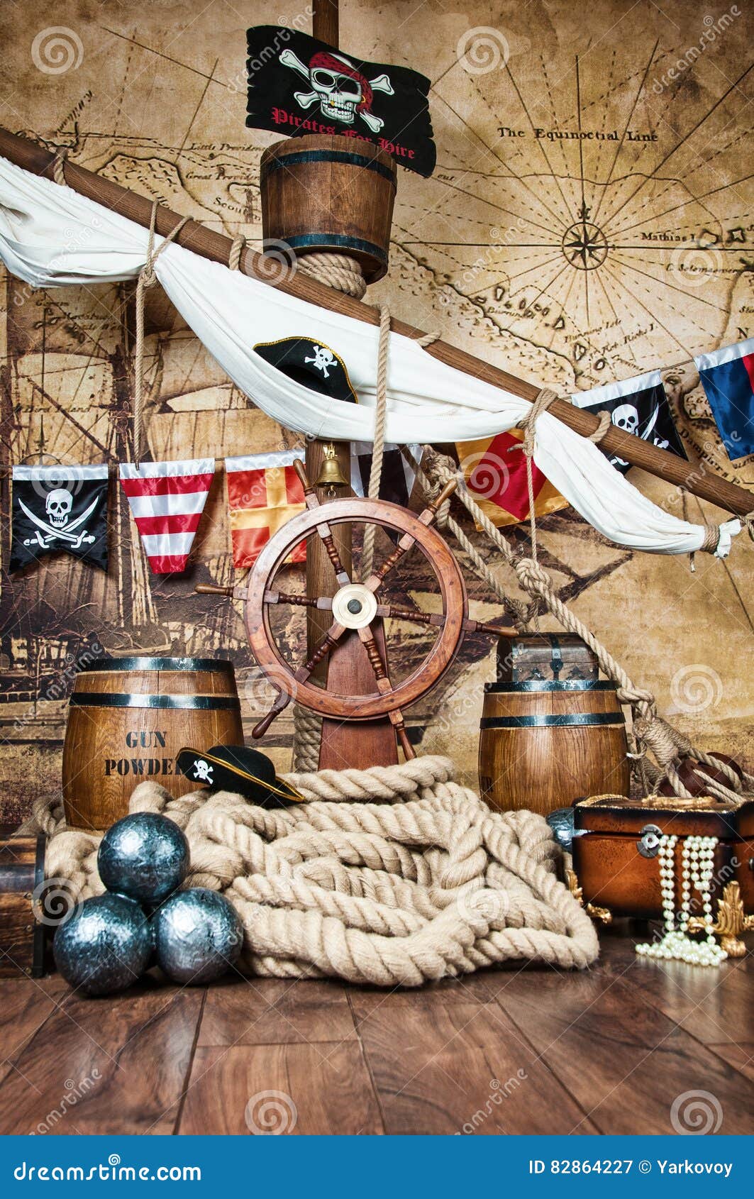 Top view of an empty frame captains wheel with fishing net and sea shells  on wooden background Stock Photo by wirestock