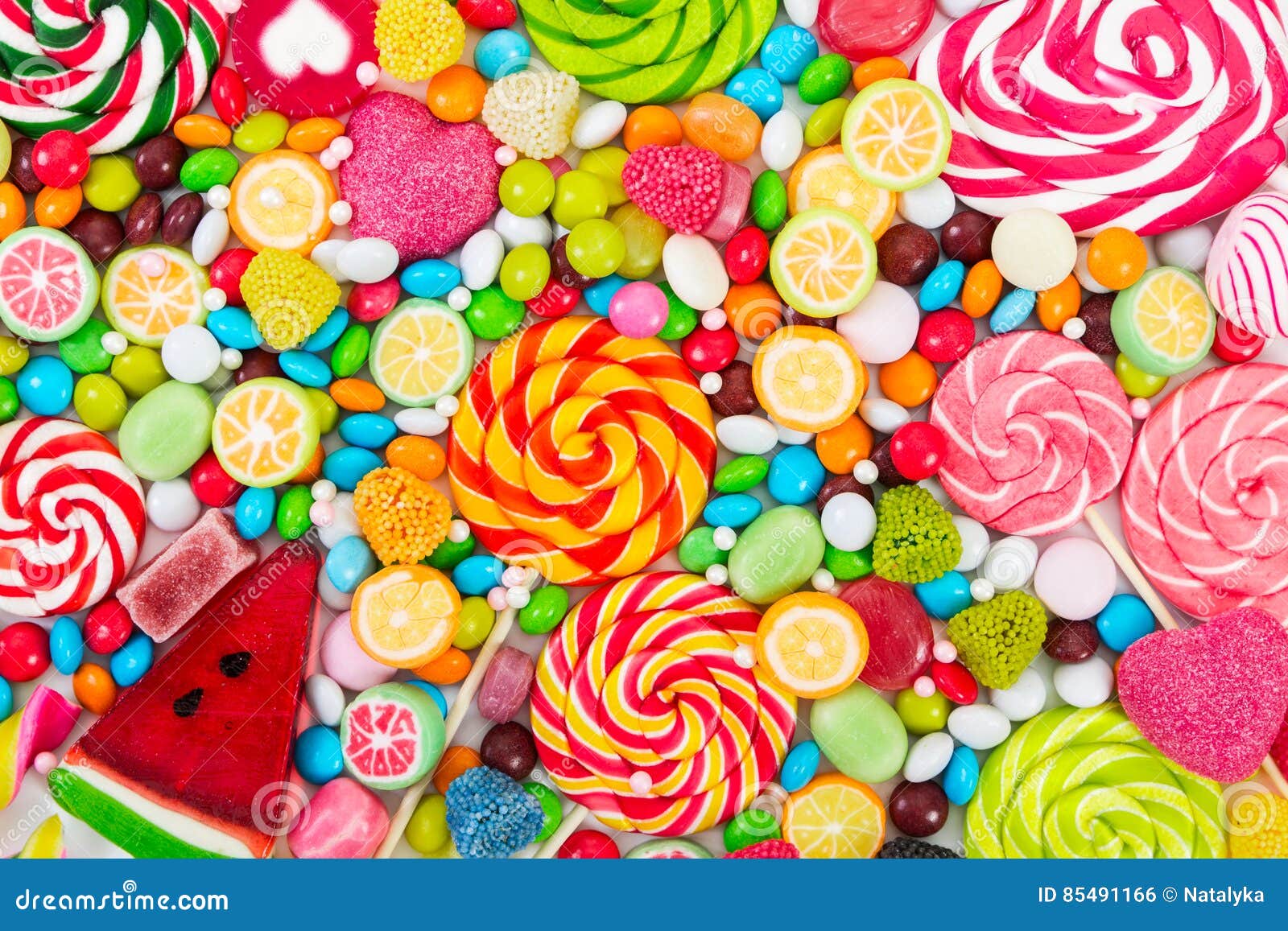 Pirulitos Coloridos E Diferente Coloridos Em Volta Dos Doces Foto de